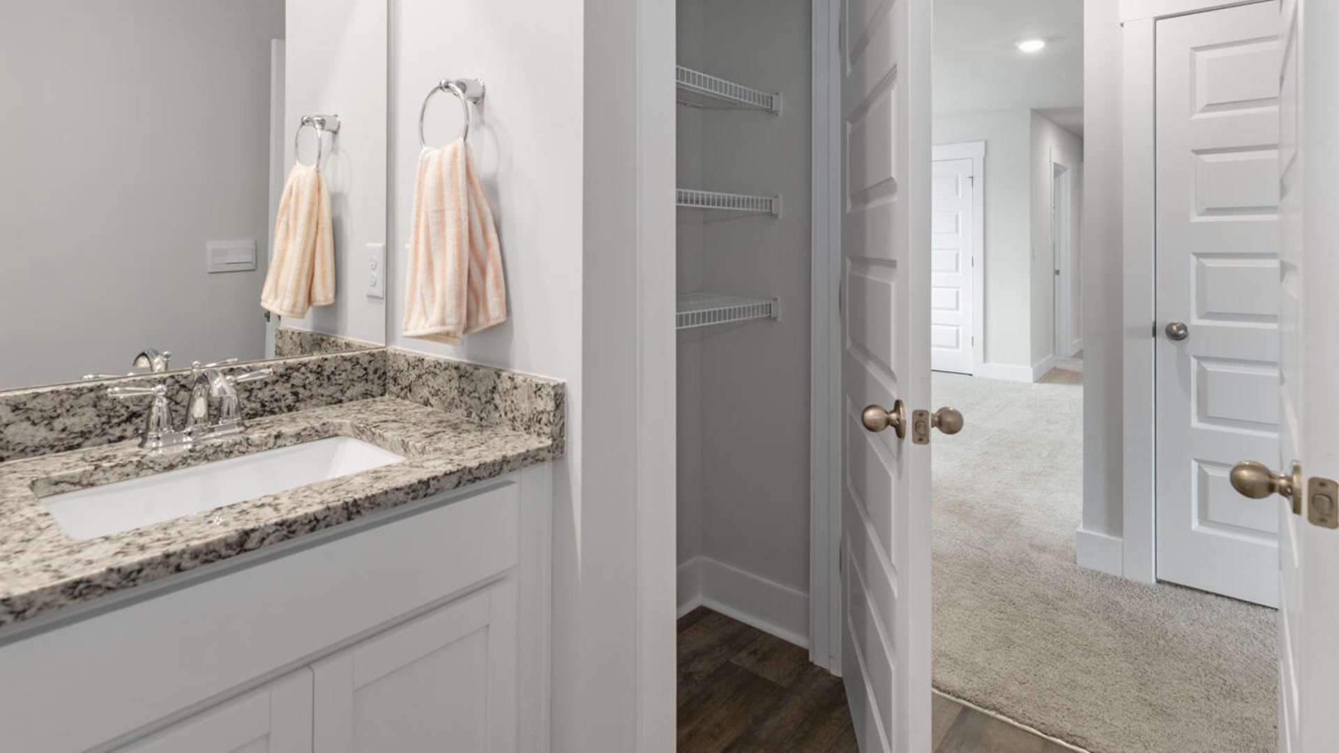 The upstairs has an additional living space, a laundry room, and a Primary Bedroom. Downstairs, a flex room can be used as an office or sitting area. In every bedroom you’ll have carpeted floors and a closet in each room. Whether these rooms become bedrooms, office spaces, or other bonus rooms, there is sure to be comfort.