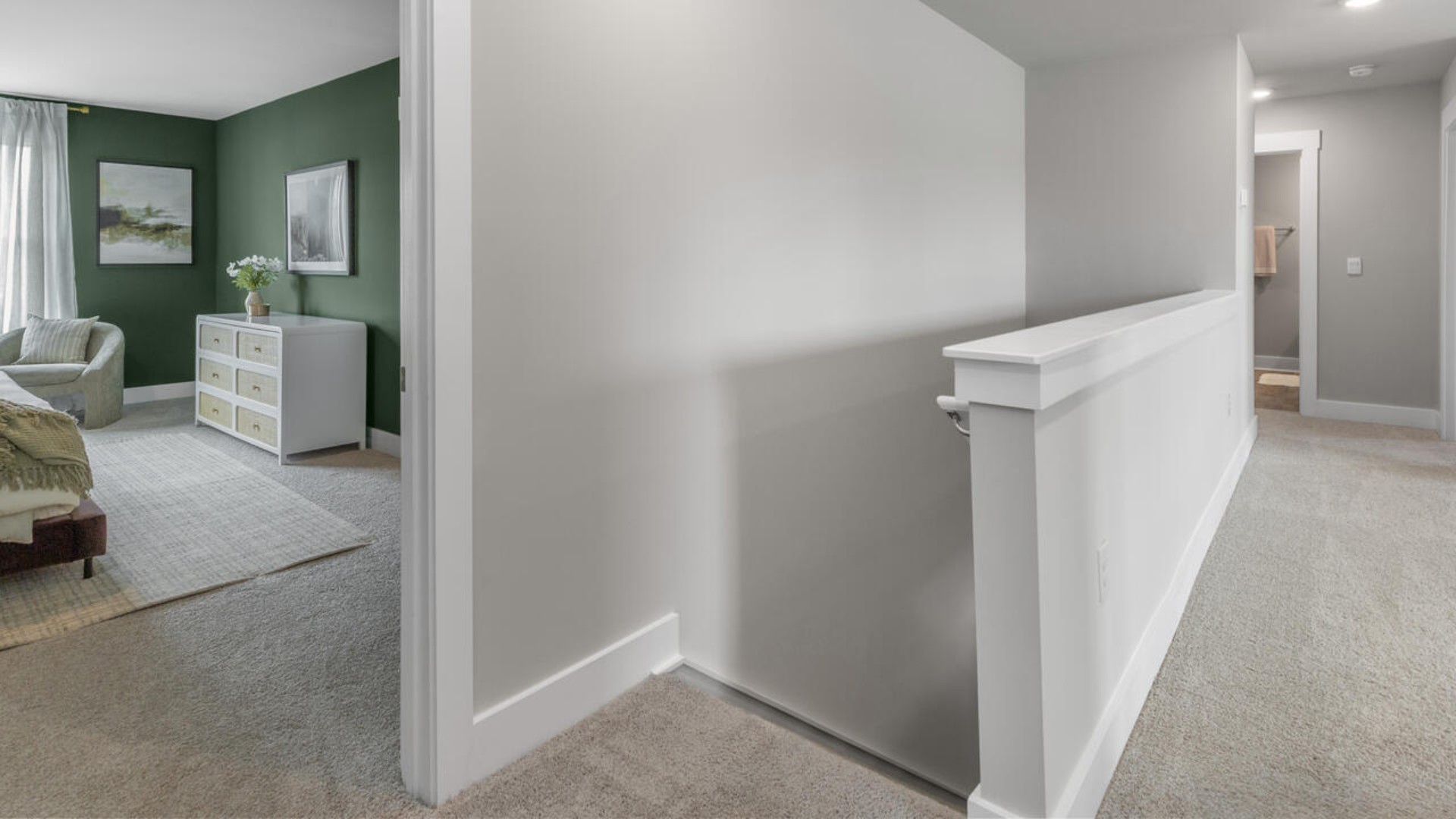 The upstairs has an additional living space, a laundry room, and a Primary Bedroom.