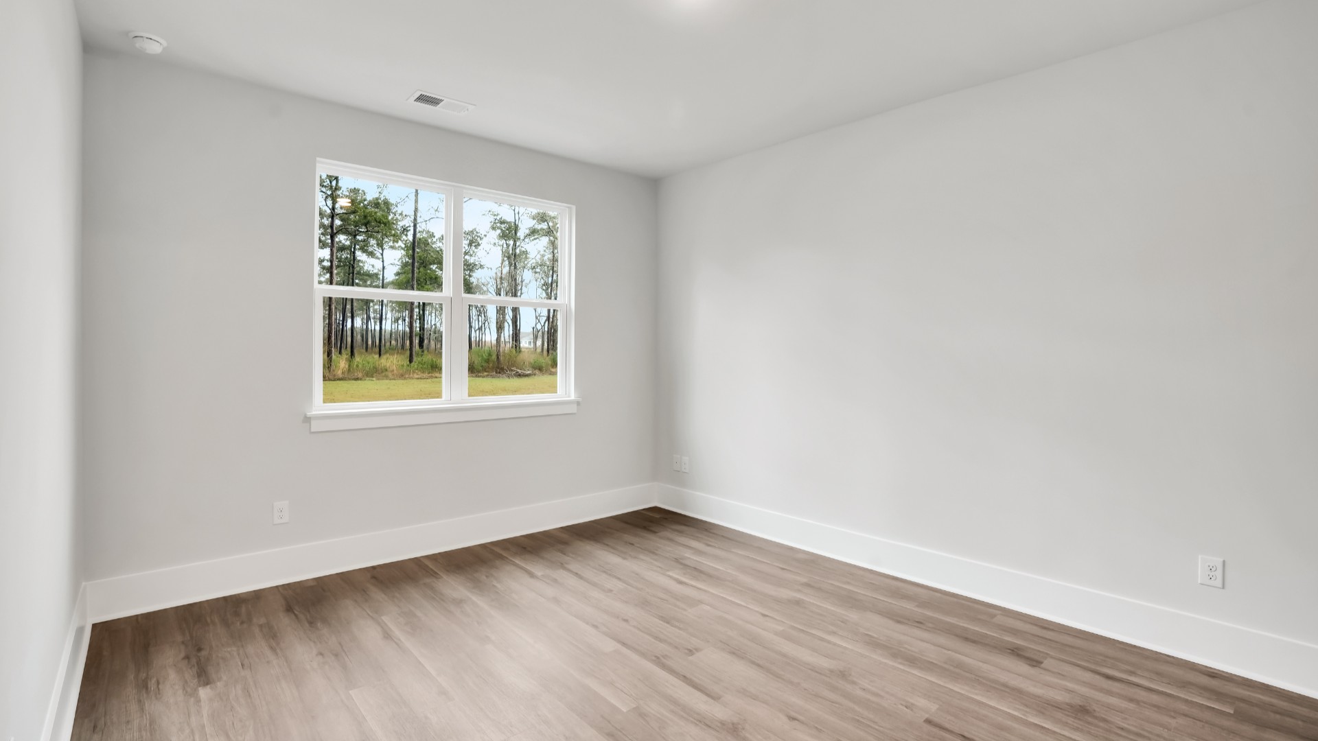 The additional bedrooms provide comfort and privacy and share access to a secondary bathroom.