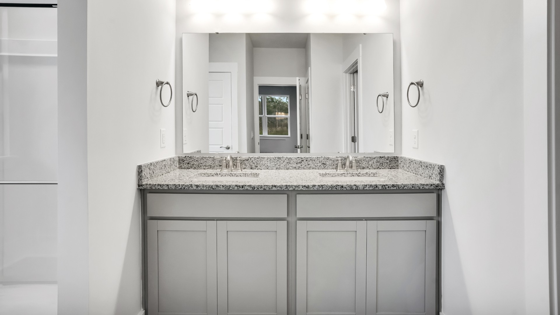 The additional bedrooms provide comfort and privacy and share access to a secondary bathroom.