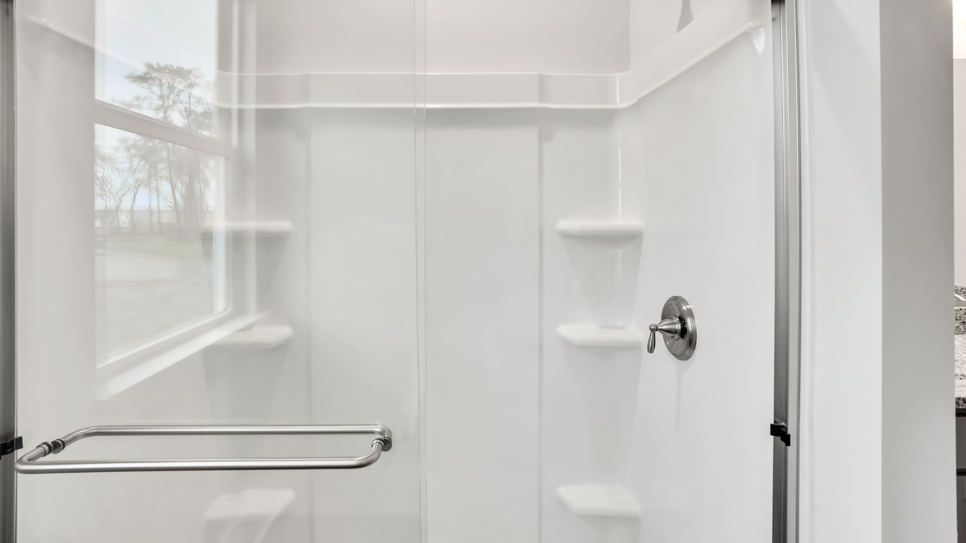 The additional bedrooms provide comfort and privacy and share access to a secondary bathroom.