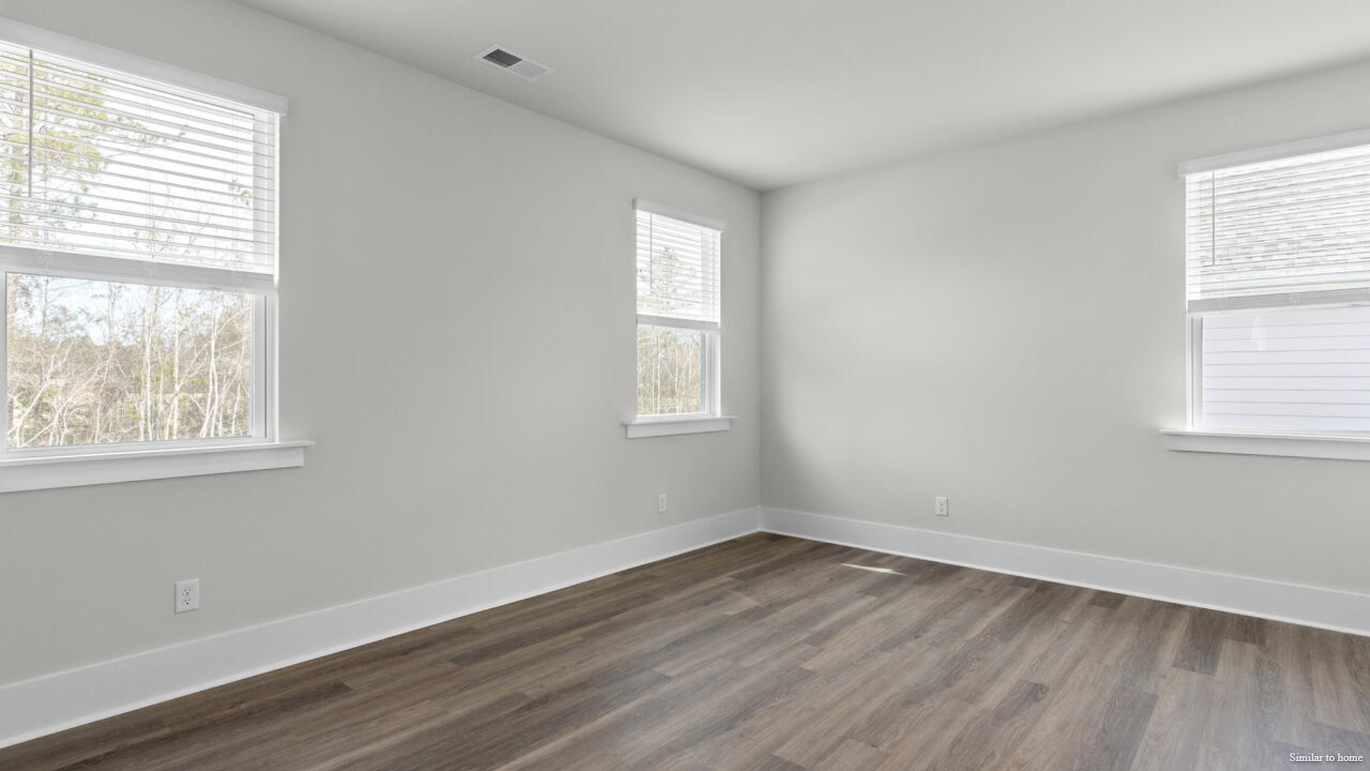 he primary suite features a step-in 5-foot shower and dual vanity
