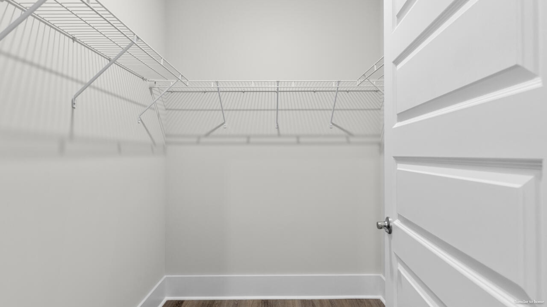 he primary suite features a step-in 5-foot shower and dual vanity