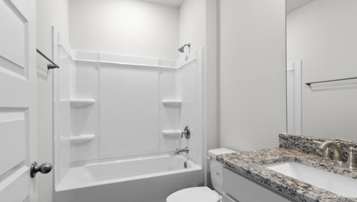Additional bedrooms are well-sized, with two sharing a bathroom and one having its own for added convenience.