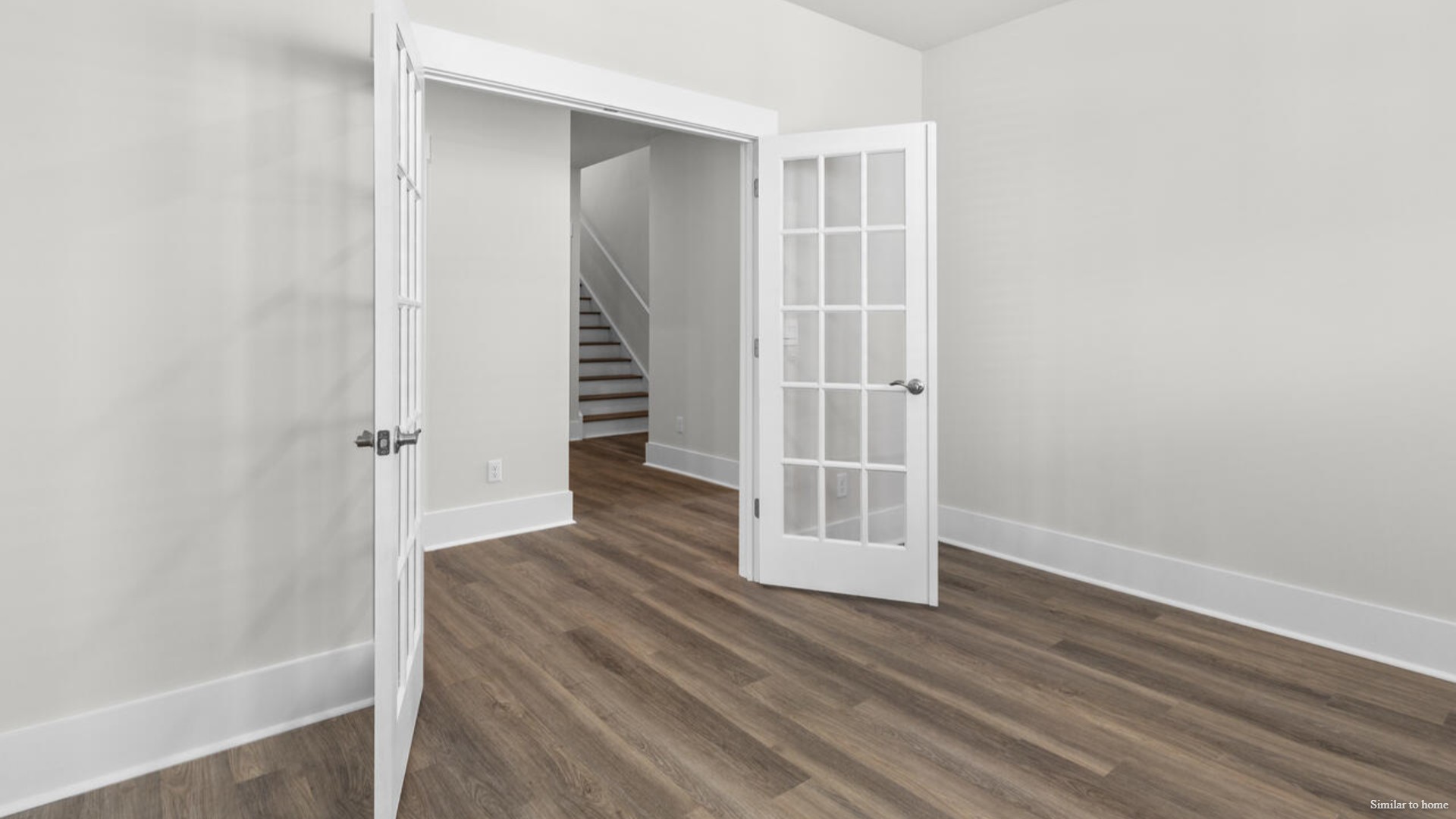 The screened-in patio sits right off of the main dining area and kitchen that features a walk-in pantry, and stainless-steel appliances! Luxury vinyl plank flooring is included throughout the home to handle all your beach days year-round.