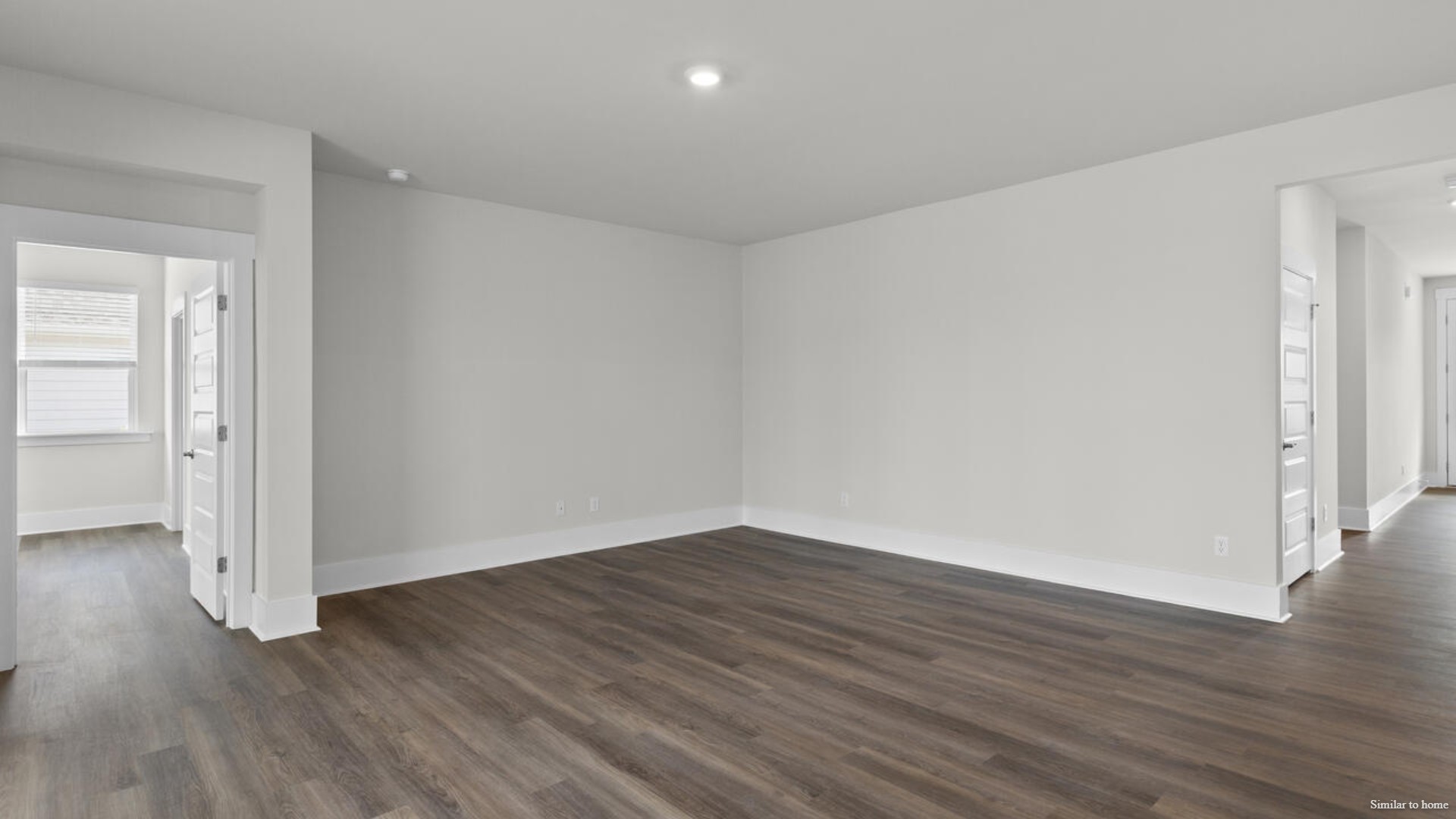 The screened-in patio sits right off of the main dining area and kitchen that features a walk-in pantry, and stainless-steel appliances! Luxury vinyl plank flooring is included throughout the home to handle all your beach days year-round.