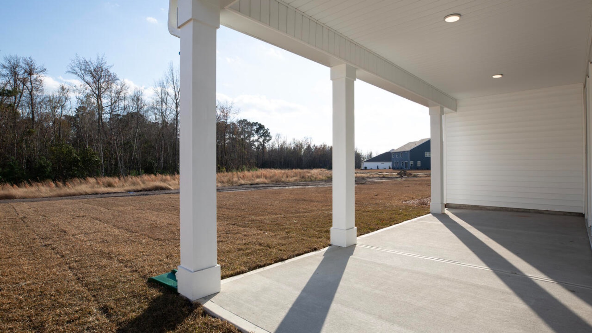 Step outside onto your covered porch to enjoy the night sky.