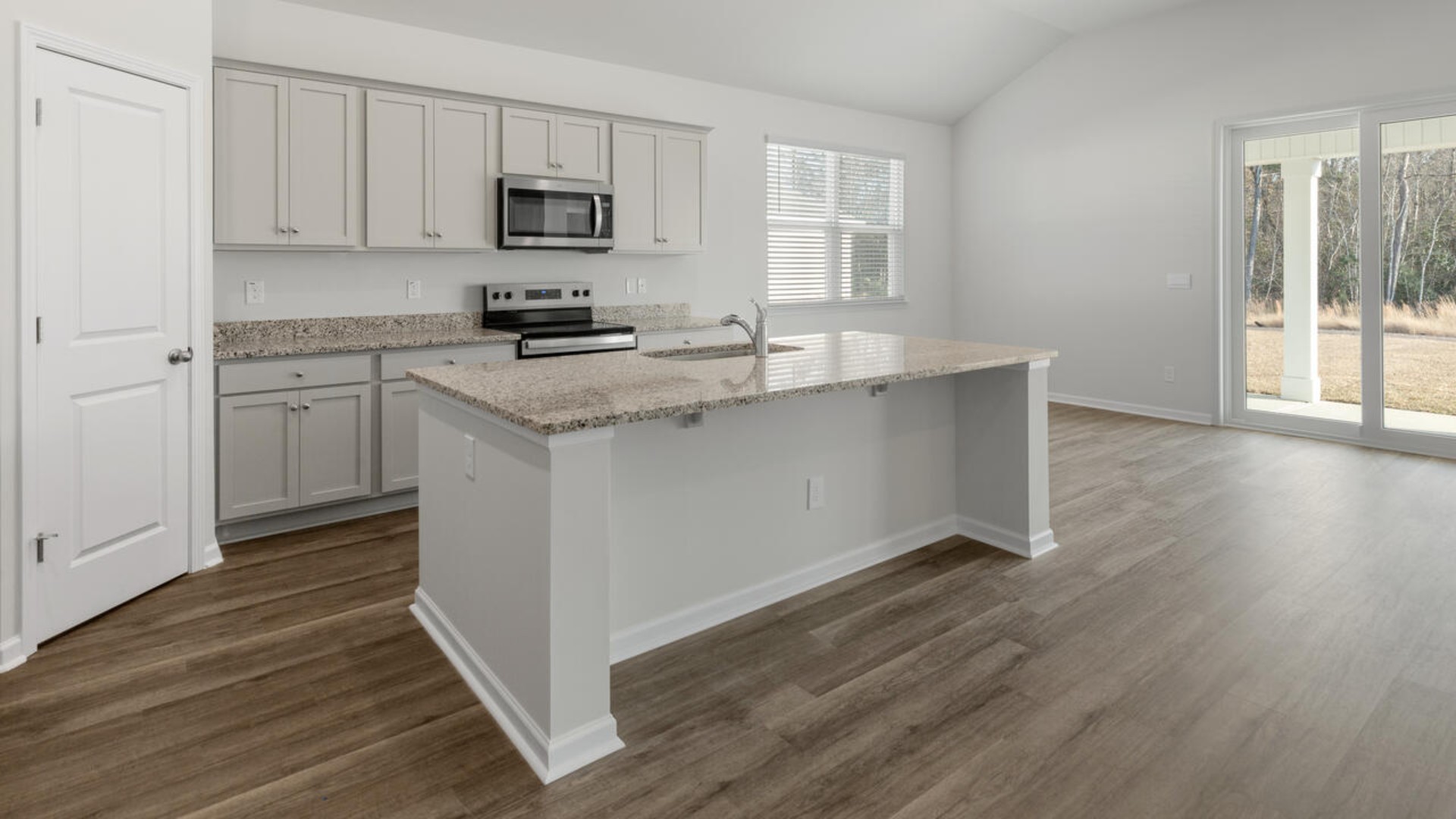 The kitchen features shaker-style cabinets, granite countertops, and stainless-steel appliances, walk-in pantry, which are sure to both turn heads and make meal prep easy.