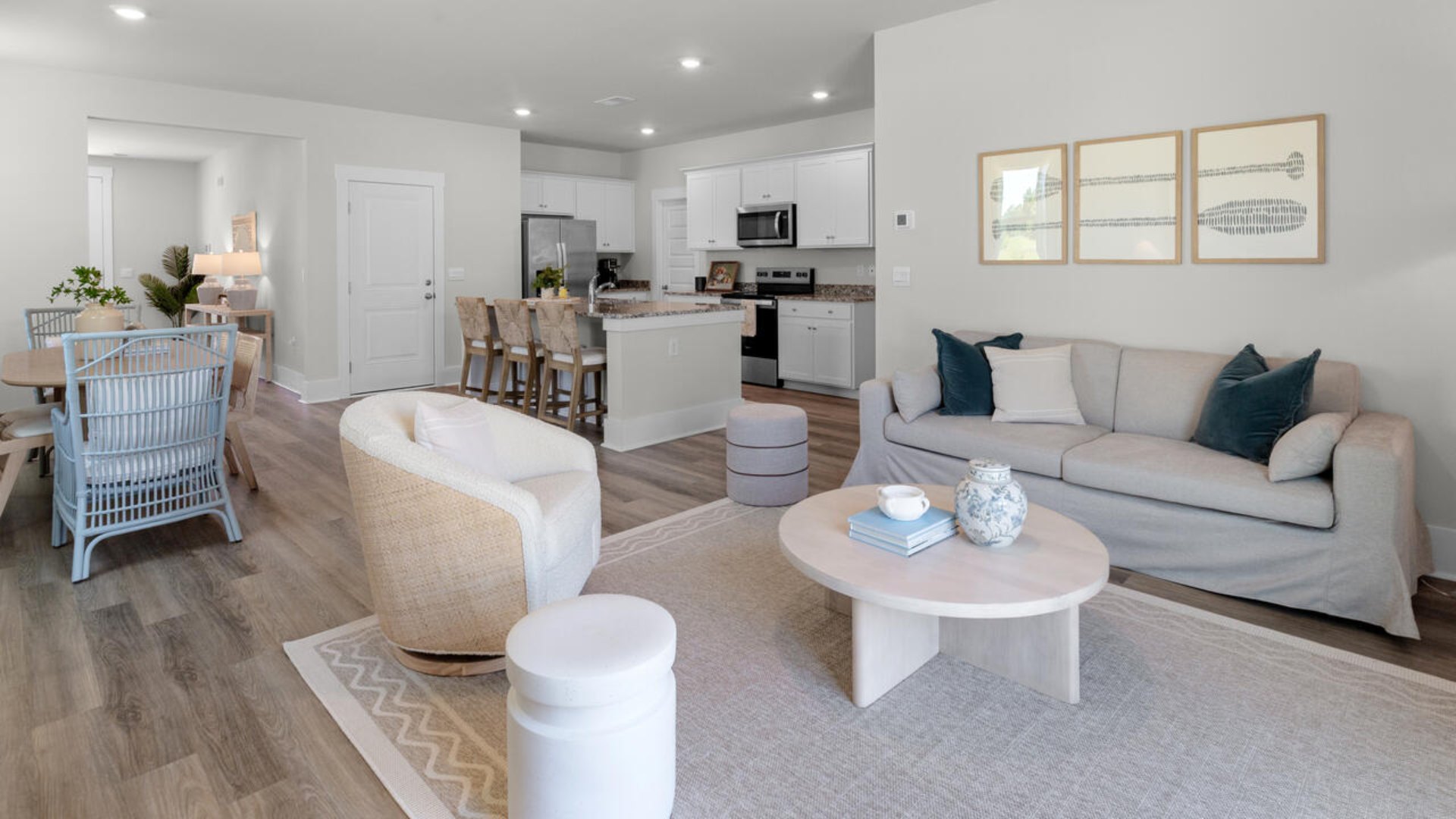 The flexible first floor includes a versatile guest room, office or playroom as well as a full bath across the hall!