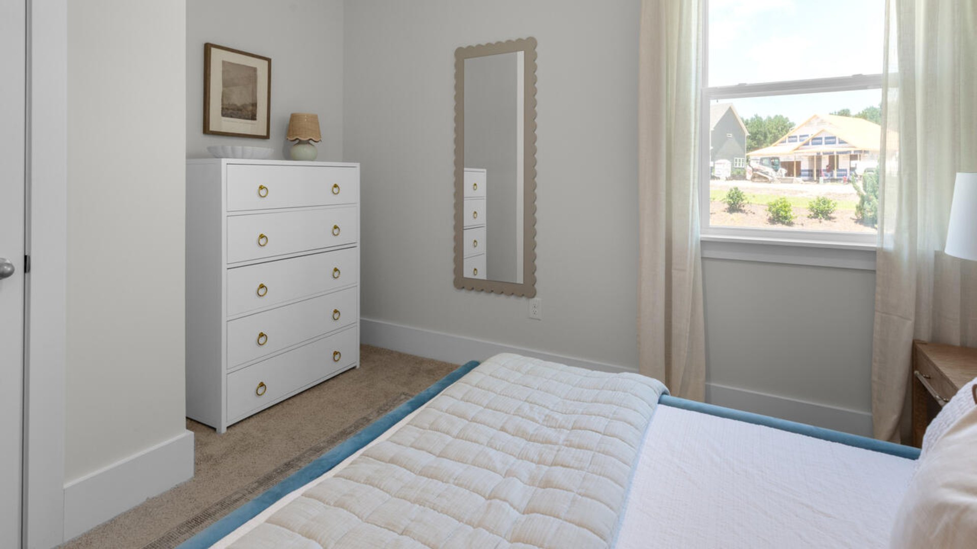 The flexible first floor includes a versatile guest room, office or playroom as well as a full bath across the hall!