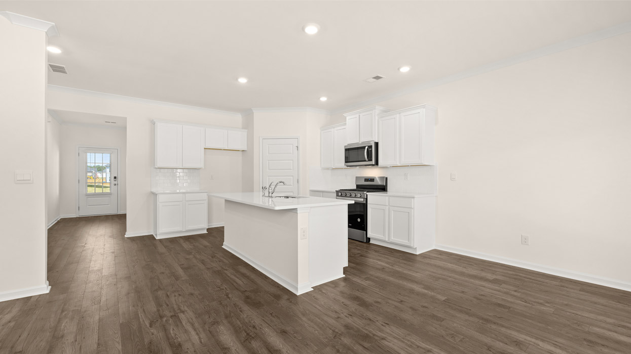 The Iberville floorplan at Cedar Hill Landing in Navassa, North Carolina is a two-story home offering 2,614 square feet of living space across 5 bedrooms and 3 full bathrooms. The 3-car garage ensures plenty of space for vehicles and storage.