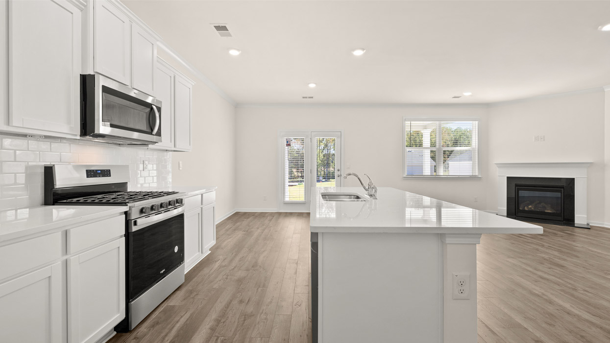 The Iberville floorplan at Cedar Hill Landing in Navassa, North Carolina is a two-story home offering 2,614 square feet of living space across 5 bedrooms and 3 full bathrooms. The 3-car garage ensures plenty of space for vehicles and storage.