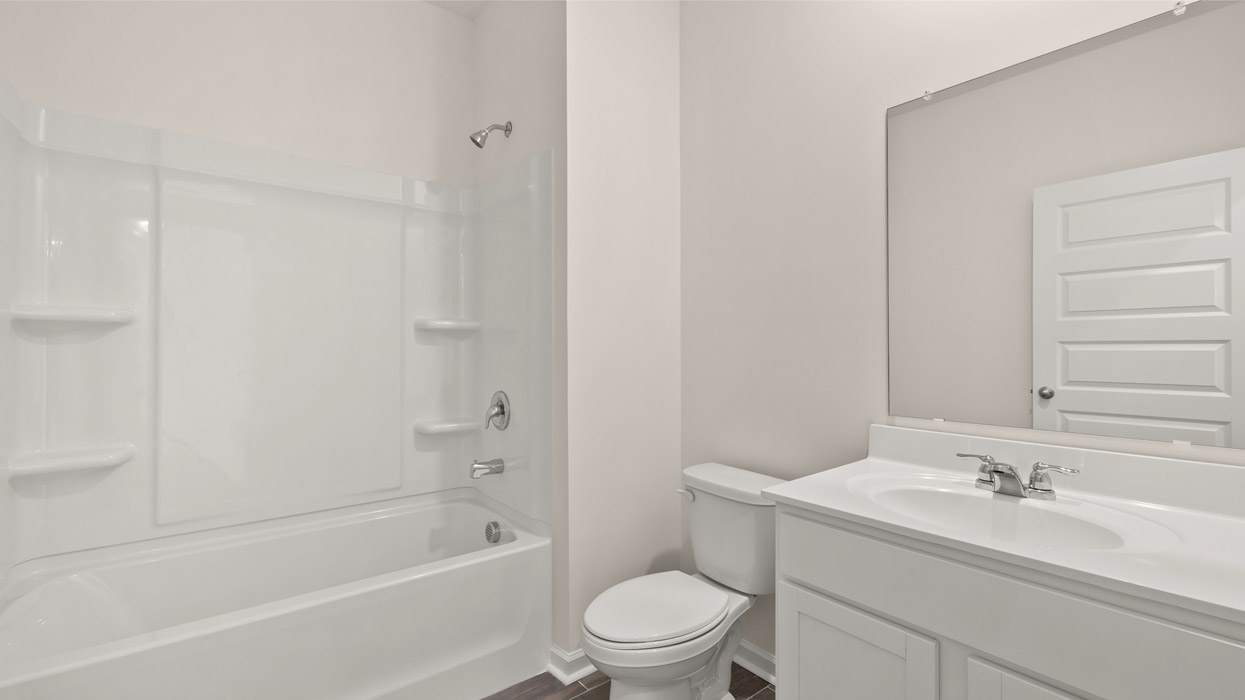 A guest bedroom plus a full bath on the main also ensures a private space for visitors.