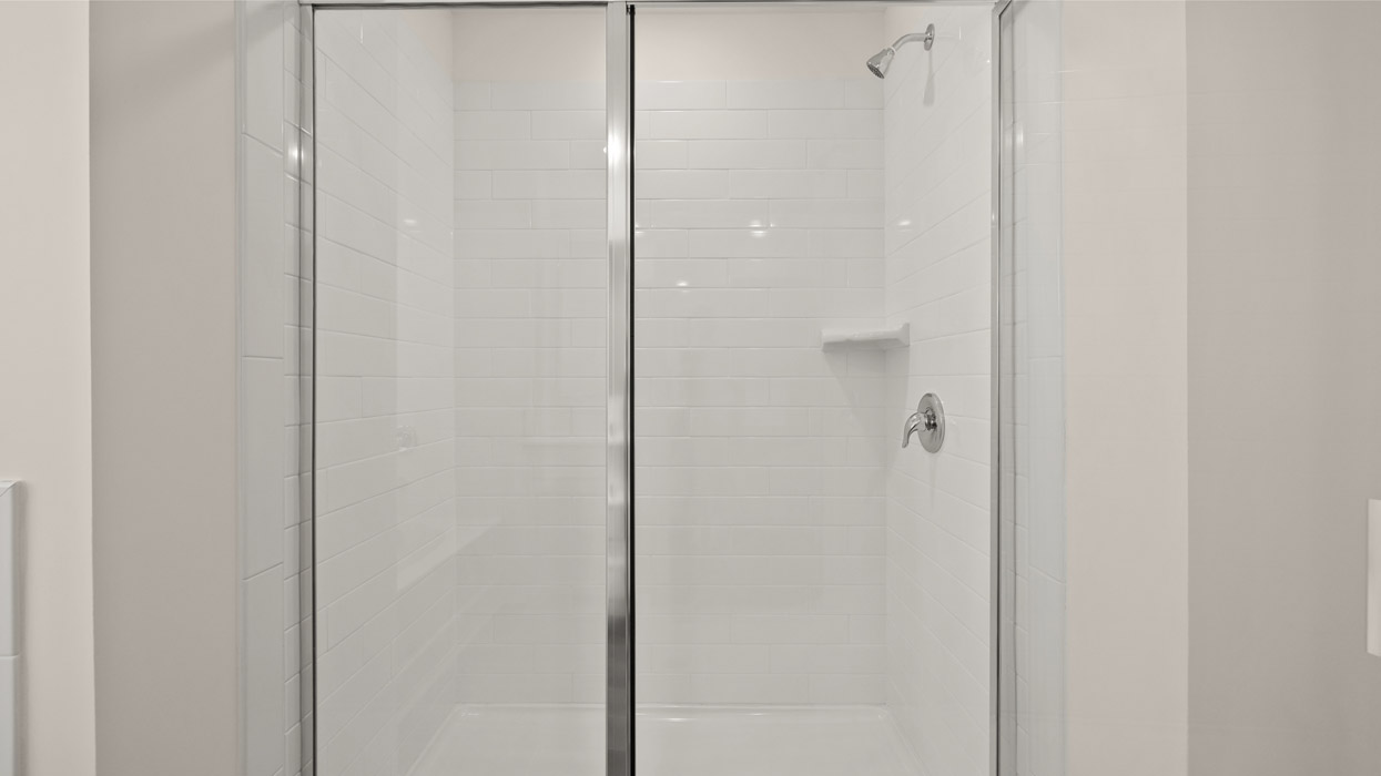 Upstairs there is a generous primary suite with adjoining bath that offers a garden tub, separate shower, dual vanities and plenty of closet space.