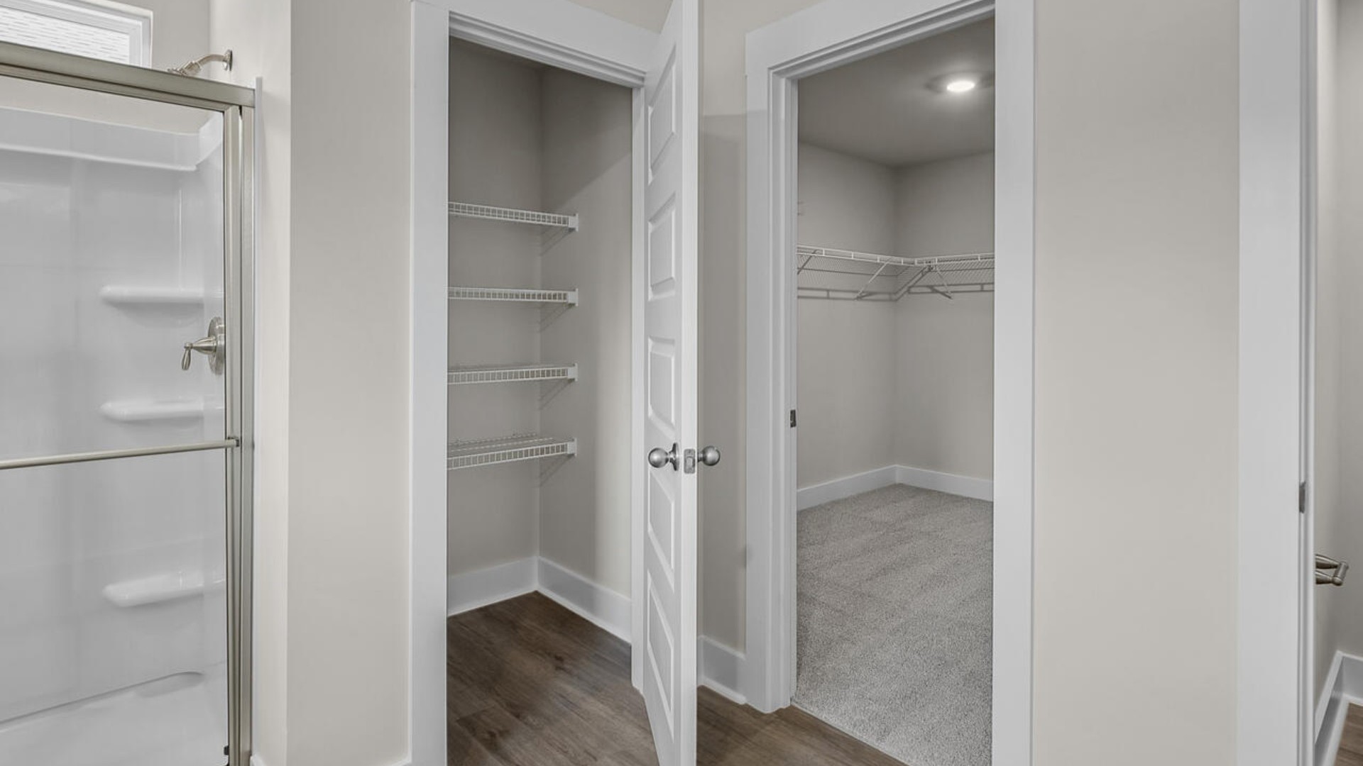 The large primary bedroom features an adjoined bathroom that will make getting ready in the morning a dream. The vanity has two sinks, the toilet is separate, and there is a walk-in shower to be sure mornings run smoothly. In the primary bathroom, you’ll also have a large walk-in closet, so there are no worries about storage space.