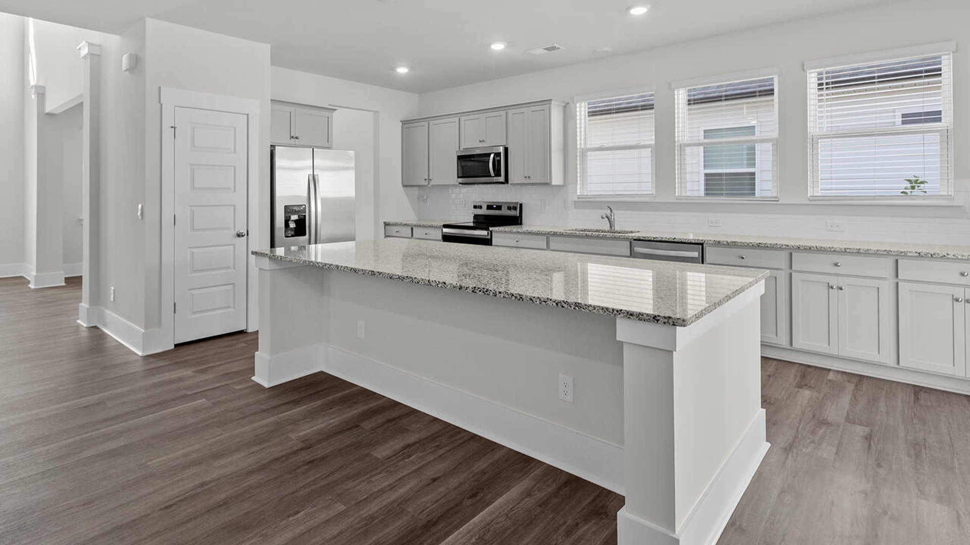 The kitchen features shaker-style cabinets, granite countertops, and stainless-steel appliances, tile backsplash which are sure to both turn heads and make meal prep easy. You’ll never b
