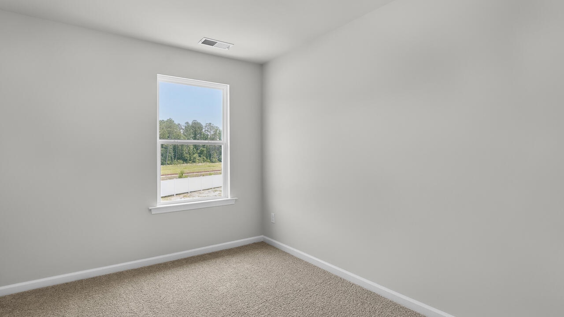 The second floor features the primary bedroom with a walk-in closet and double vanities. It also includes two additional bedrooms, a shared bathroom, and a laundry room for convenience.
