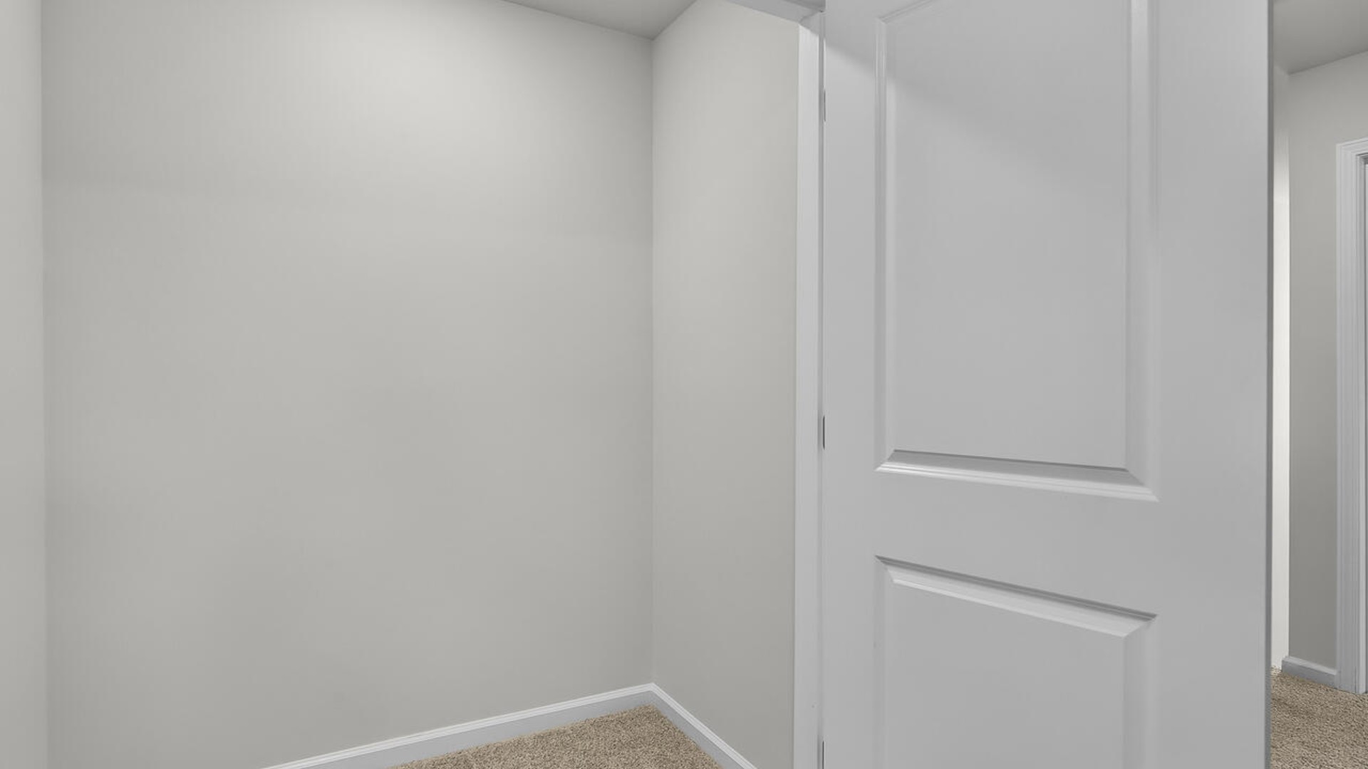 The second floor features the primary bedroom with a walk-in closet and double vanities. It also includes two additional bedrooms, a shared bathroom, and a laundry room for convenience.