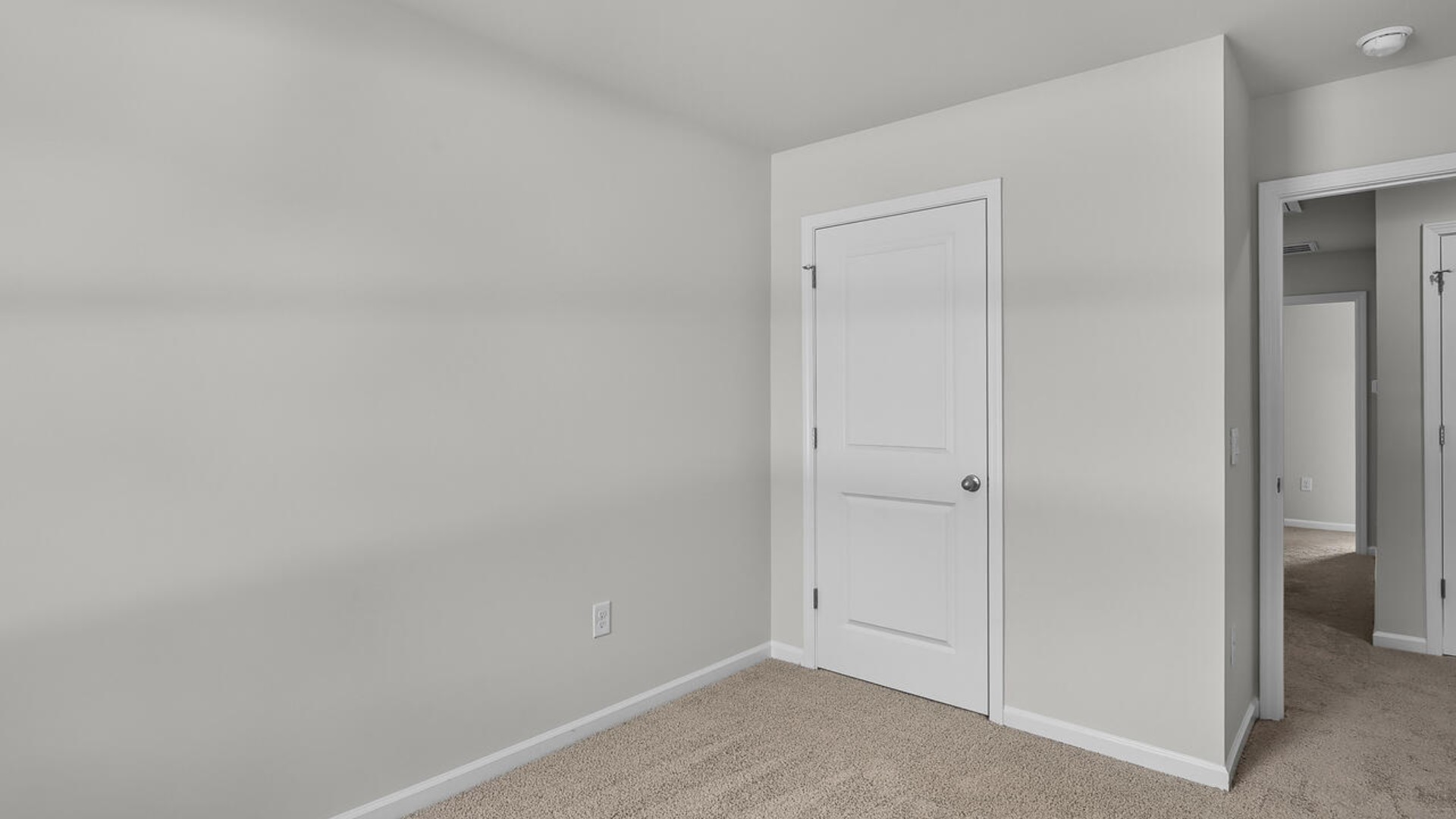 It also includes two additional bedrooms, a shared bathroom, and a laundry room for convenience
