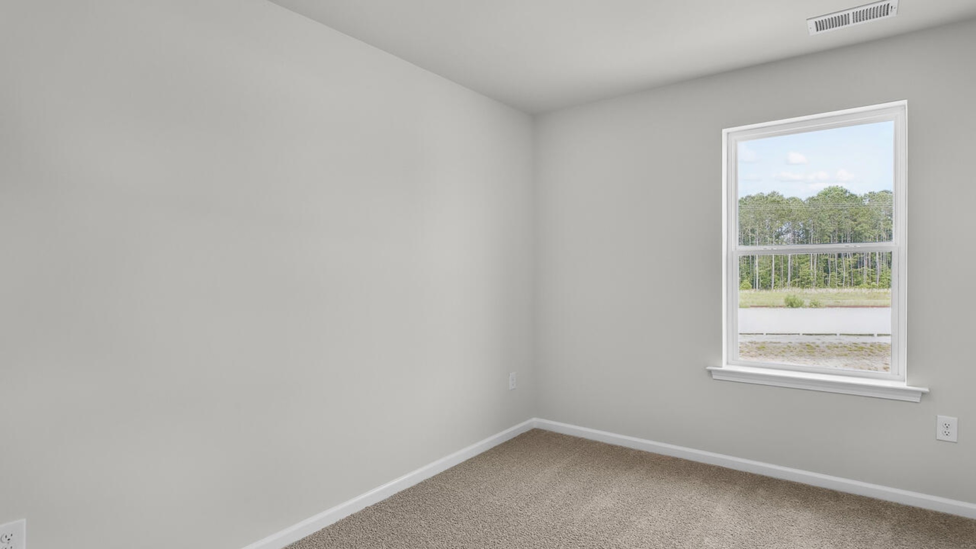 It also includes two additional bedrooms, a shared bathroom, and a laundry room for convenience
