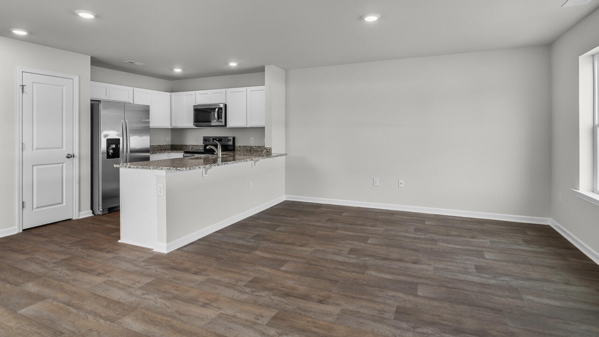 Step inside and discover a bright and airy open floor plan designed for both relaxing and entertaining. The kitchen is a showstopper with granite countertops, stainless steel appliances that are as durable as they are dazzling.