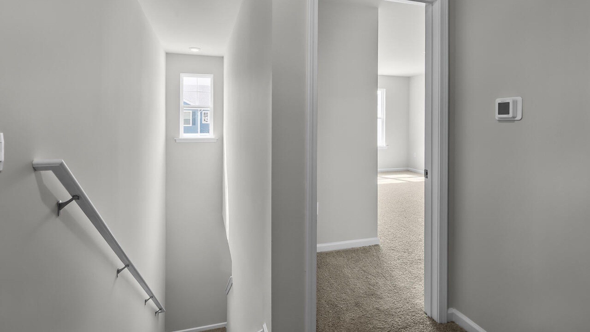 The second floor features the primary bedroom with a walk-in closet and double vanities.