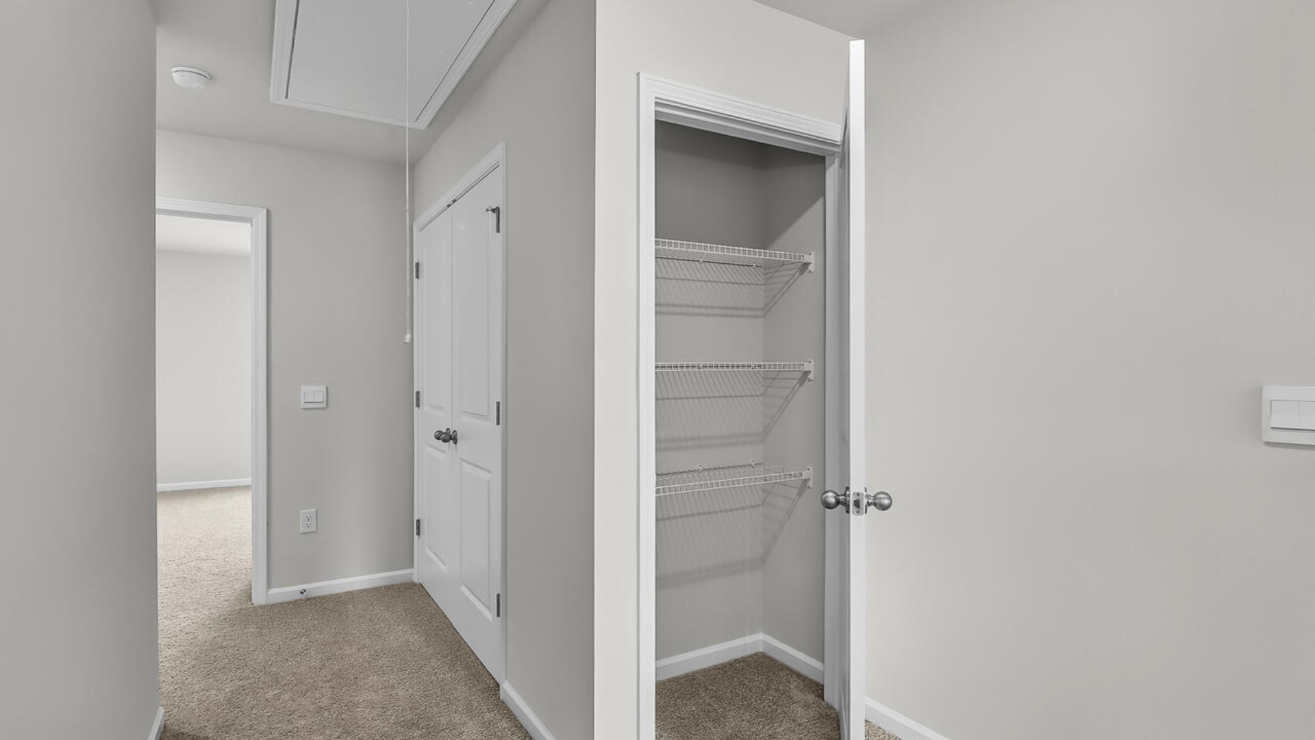 The second floor features the primary bedroom with a walk-in closet and double vanities.