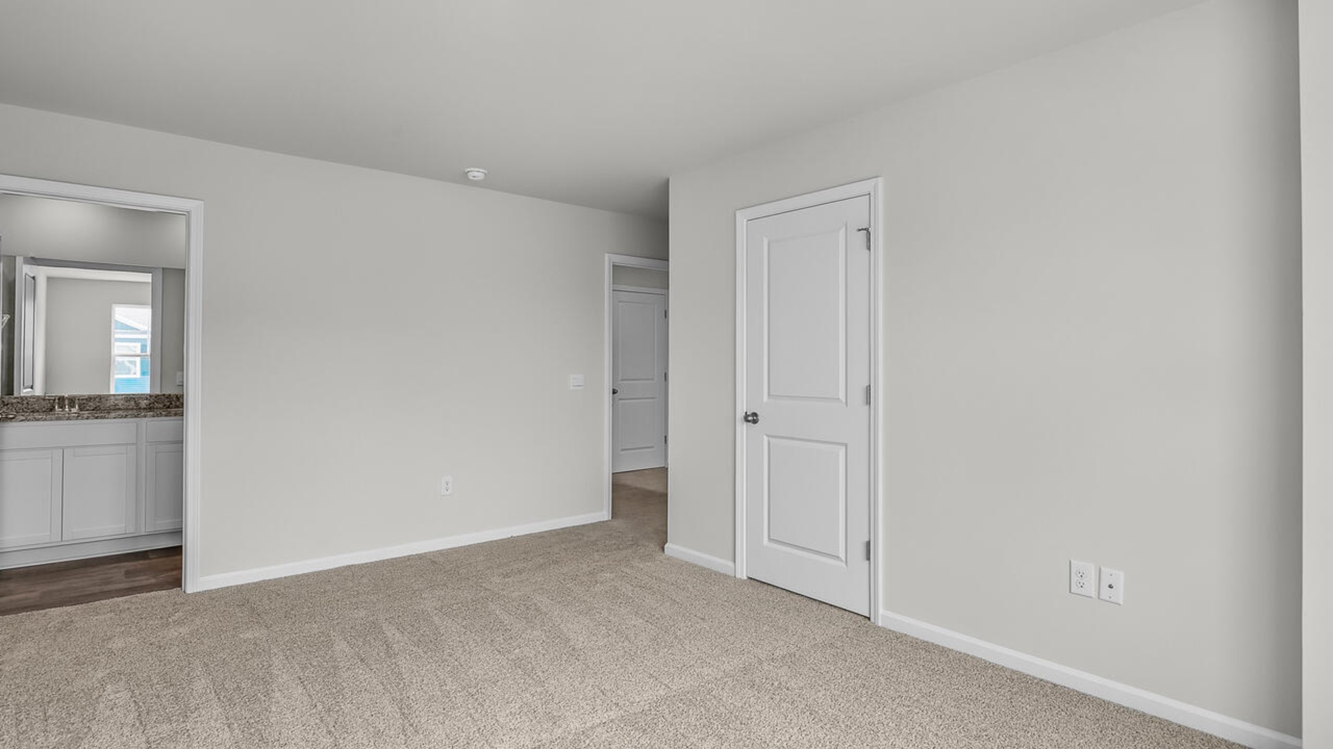 The second floor features the primary bedroom with a walk-in closet and double vanities.