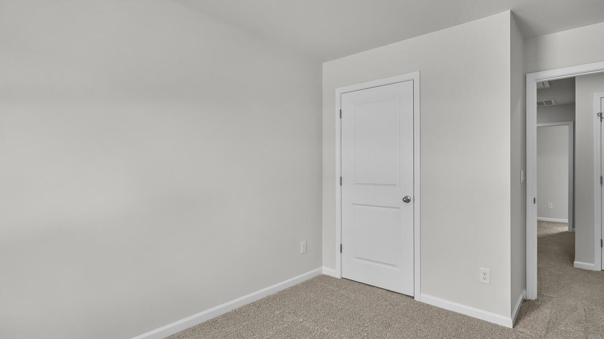 It also includes two additional bedrooms, a shared bathroom, and a laundry room for convenience. The bathrooms are equally elegant, featuring matching granite and a primary suite with a glass shower that feels like your own personal spa.