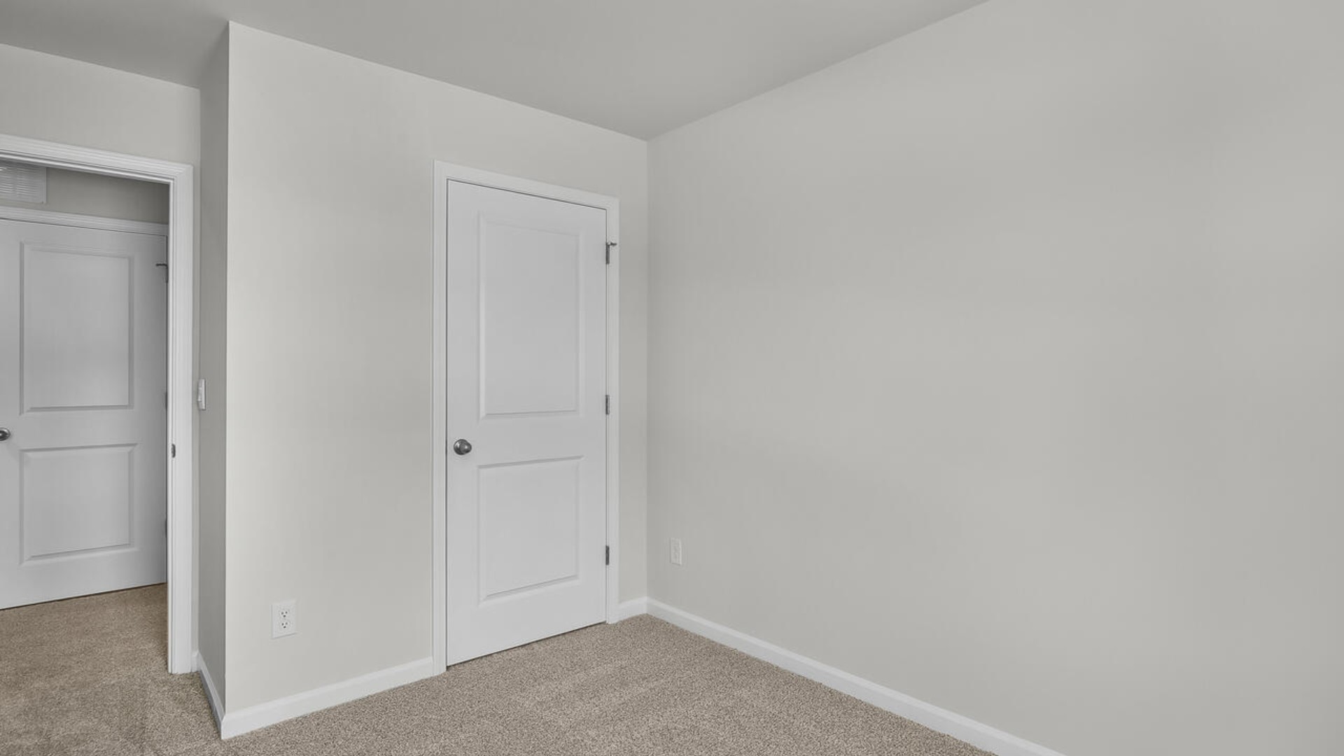 It also includes two additional bedrooms, a shared bathroom, and a laundry room for convenience. The bathrooms are equally elegant, featuring matching granite and a primary suite with a glass shower that feels like your own personal spa.