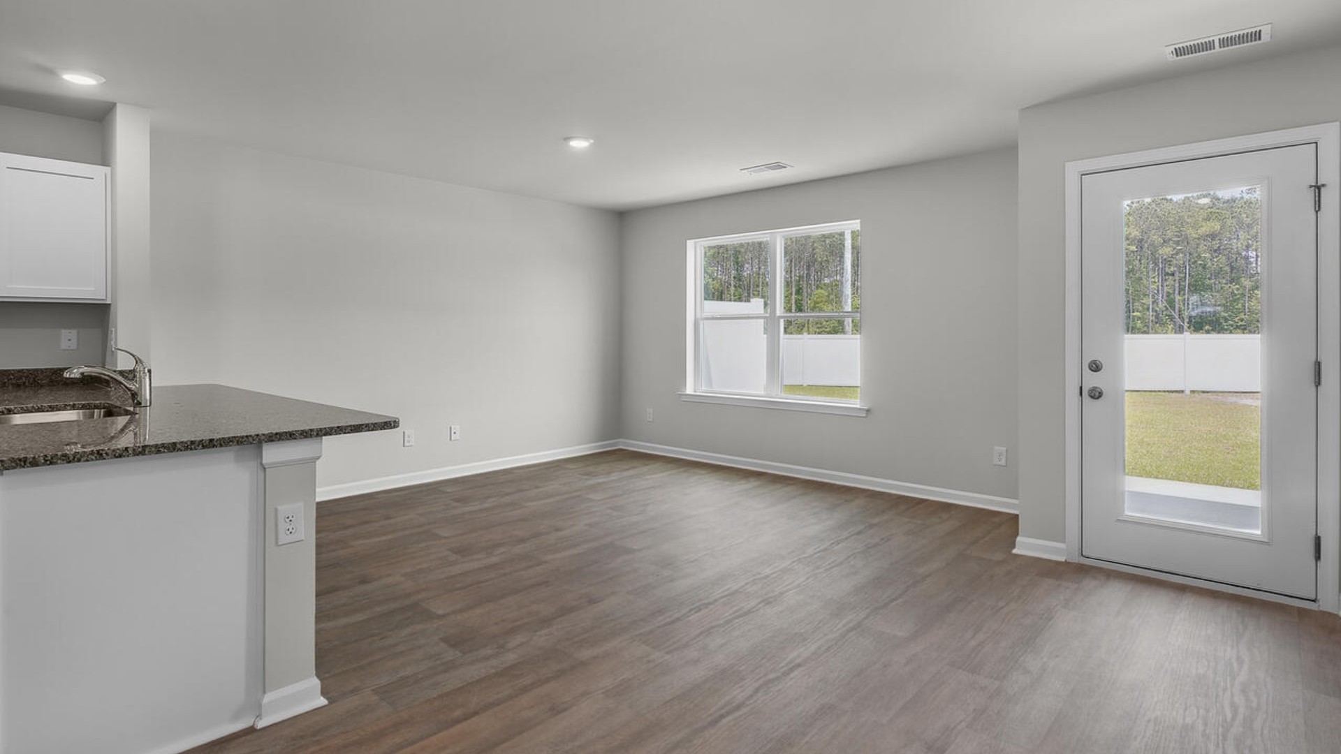 Step inside and discover a bright and airy open floor plan designed for both relaxing and entertaining. The kitchen is a showstopper with granite countertops, stainless steel appliances that are as durable as they are dazzling.