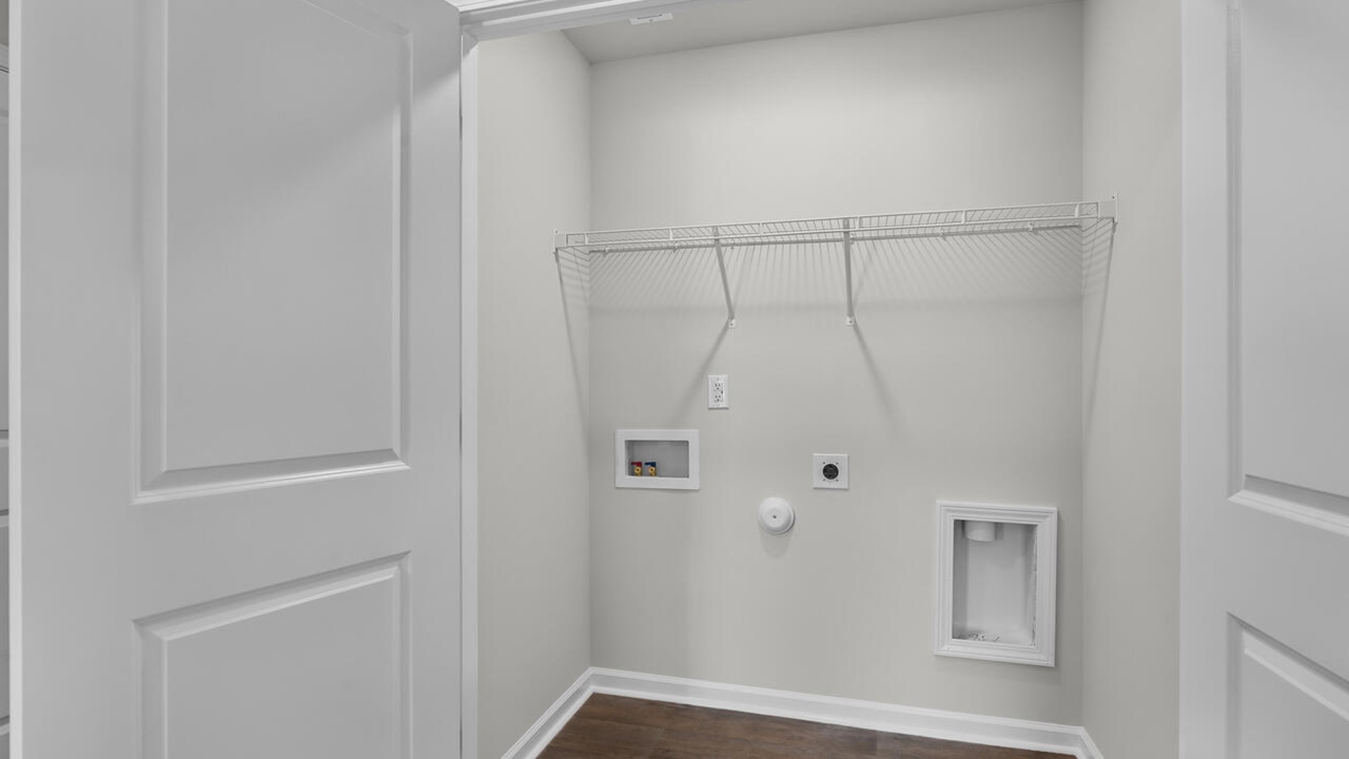 It also includes two additional bedrooms, a shared bathroom, and a laundry room for convenience. If you're looking for a functional and stylish two-story home, the Pearson is an excellent choice.
