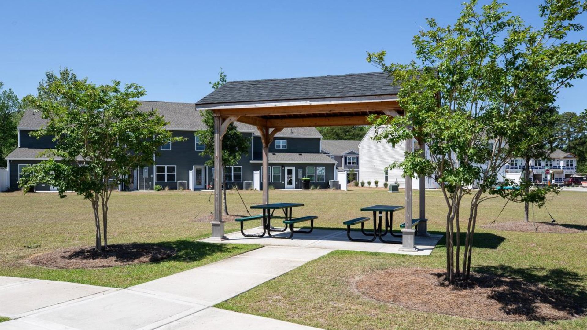 Homeowners enjoy the community amenities a pool, pavilion, fire pit, playground, and grill stations. T