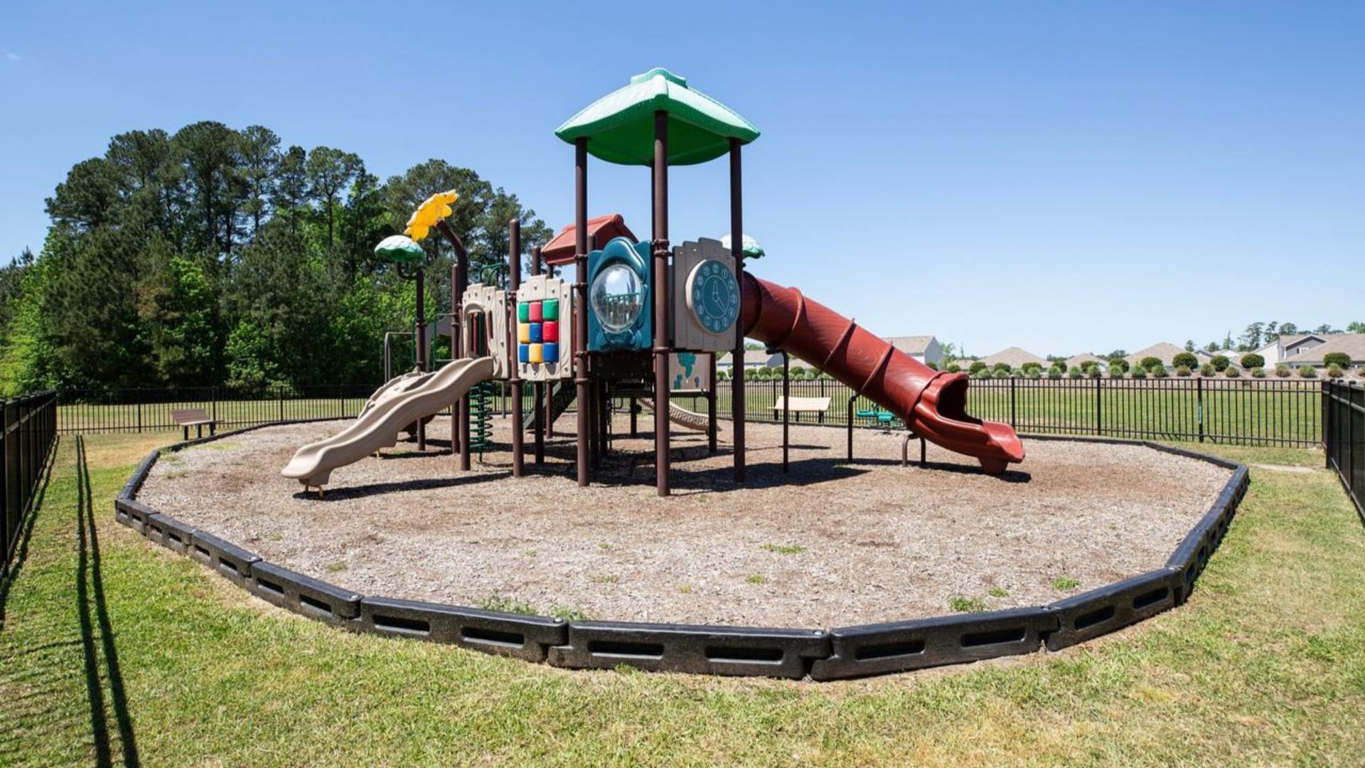 Homeowners enjoy the community amenities a pool, pavilion, fire pit, playground, and grill stations. T
