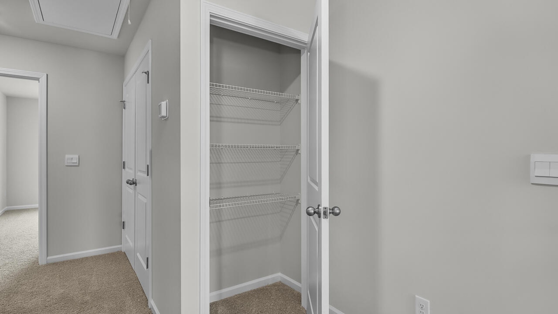 The second floor features the primary bedroom with a walk-in closet and double vanities.