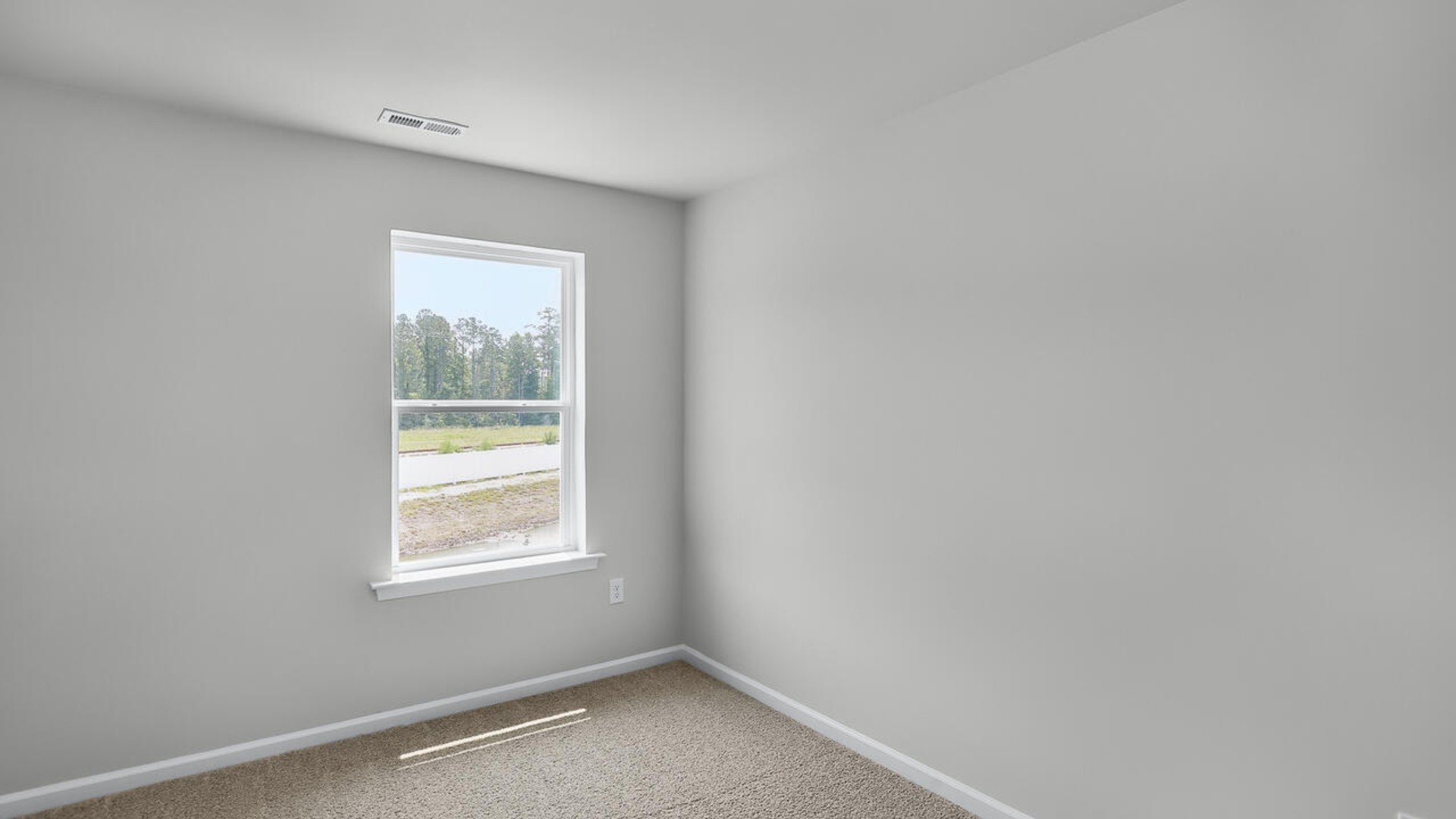 It also includes two additional bedrooms, a shared bathroom, and a laundry room for convenience.