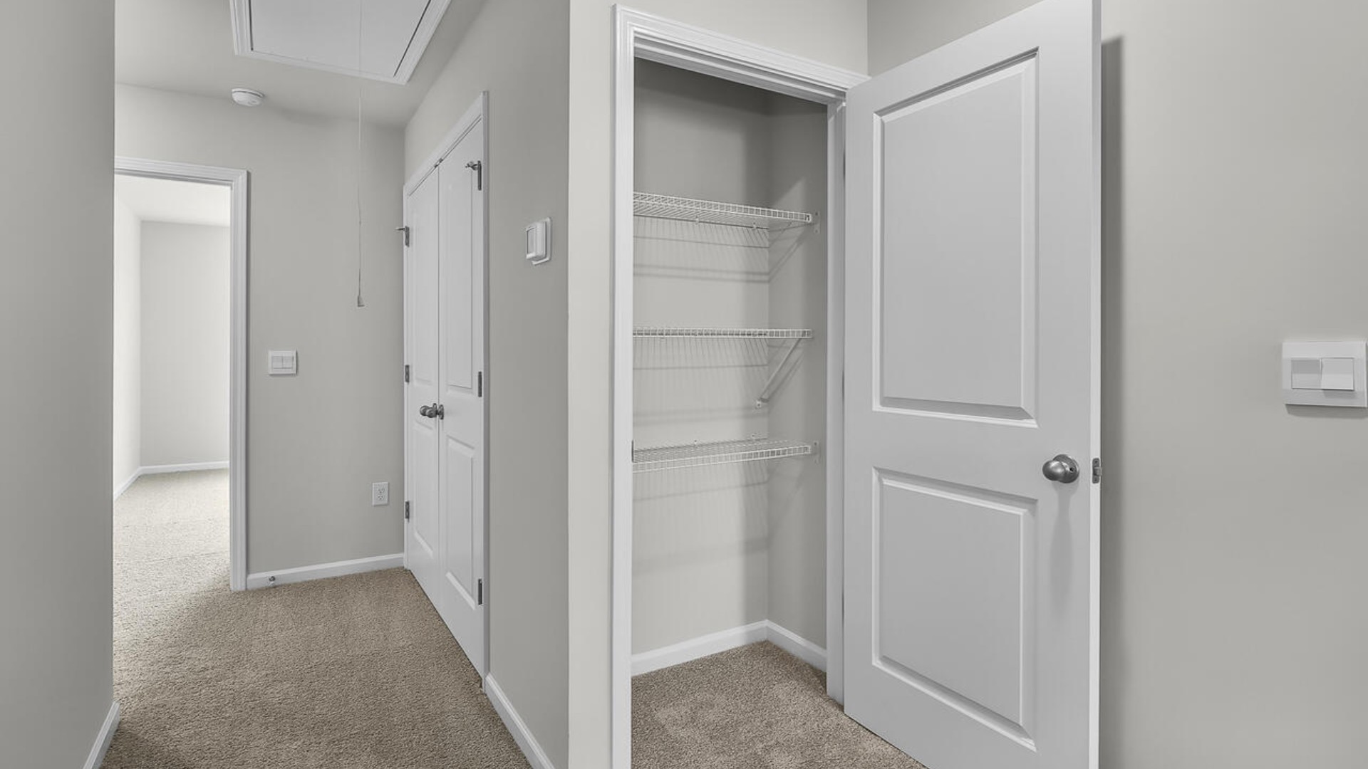 The second floor features the primary bedroom with a walk-in closet and double vanities.