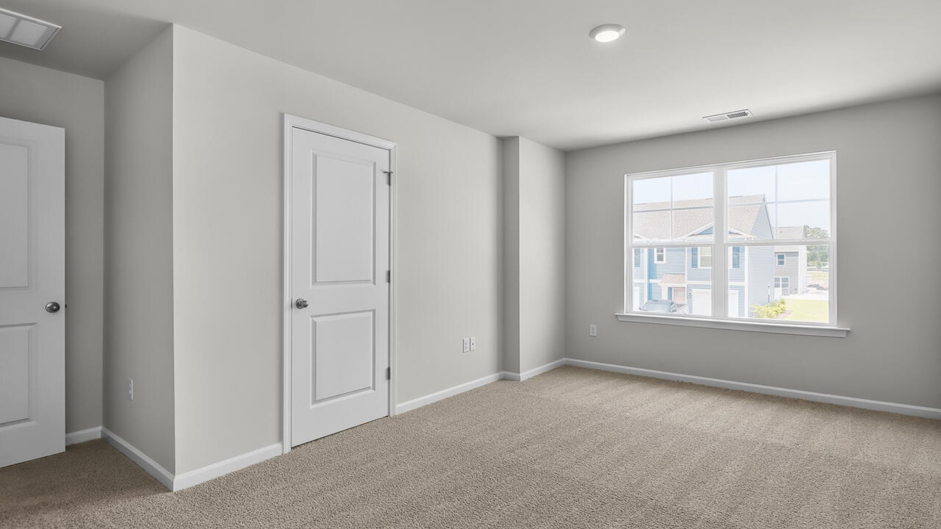 The second floor features the primary bedroom with a walk-in closet and double vanities.