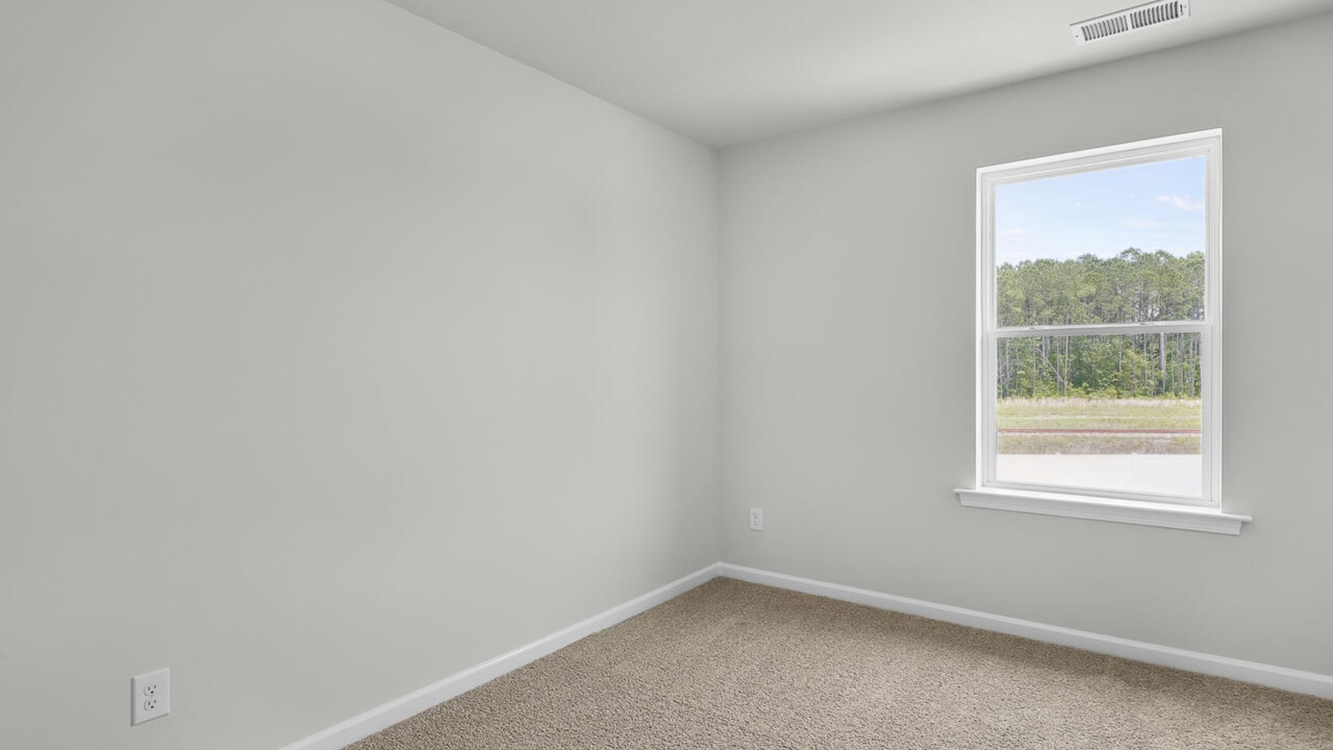 The second floor features the primary bedroom with a walk-in closet and double vanities. It also includes two additional bedrooms, a shared bathroom, and a laundry room for convenience.