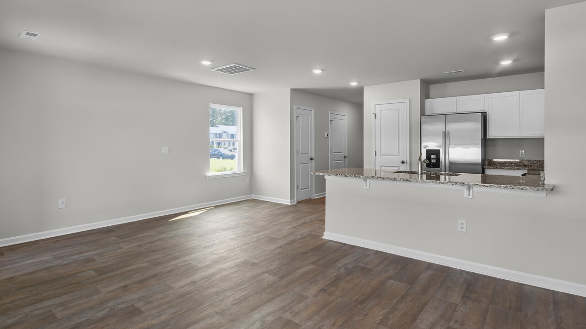 Step inside and discover a bright and airy open floor plan designed for both relaxing and entertaining. The kitchen is a showstopper with granite countertops, stainless steel appliances that are as durable as they are dazzling.
