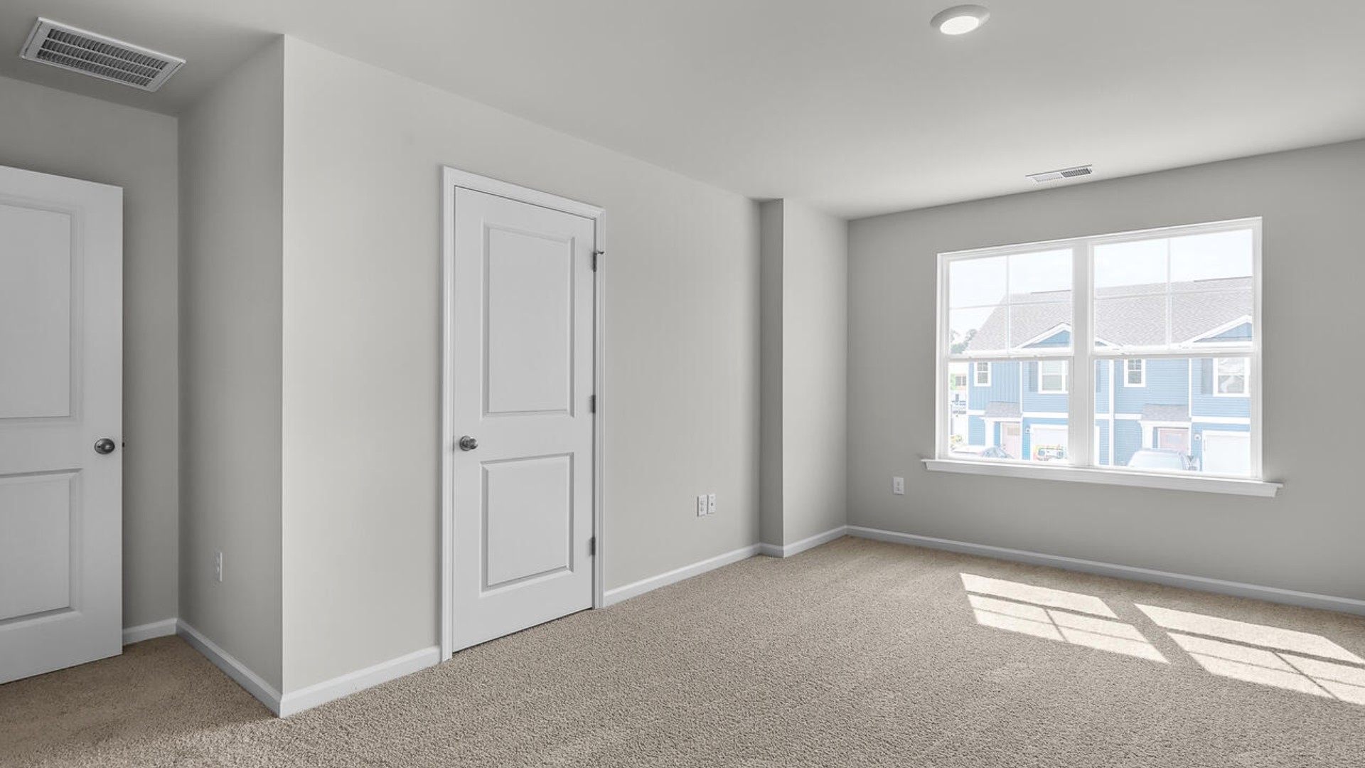 The second floor features the primary bedroom with a walk-in closet and double vanities. I