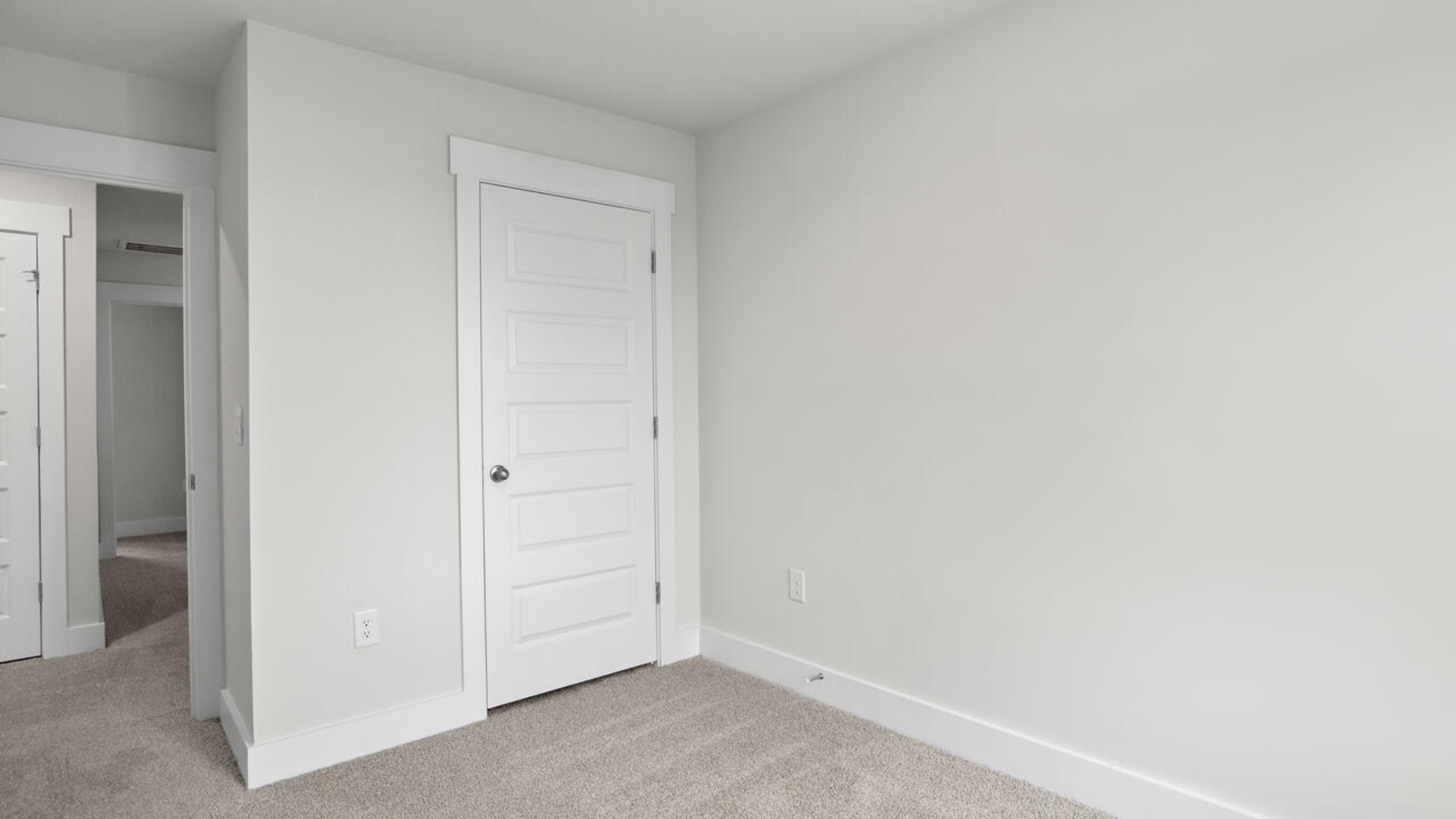 also includes two additional bedrooms, a shared bathroom, and a laundry room for convenience. The bathrooms are equally elegant, featuring matching granite and a primary suite with a glass shower that feels like your own personal spa.