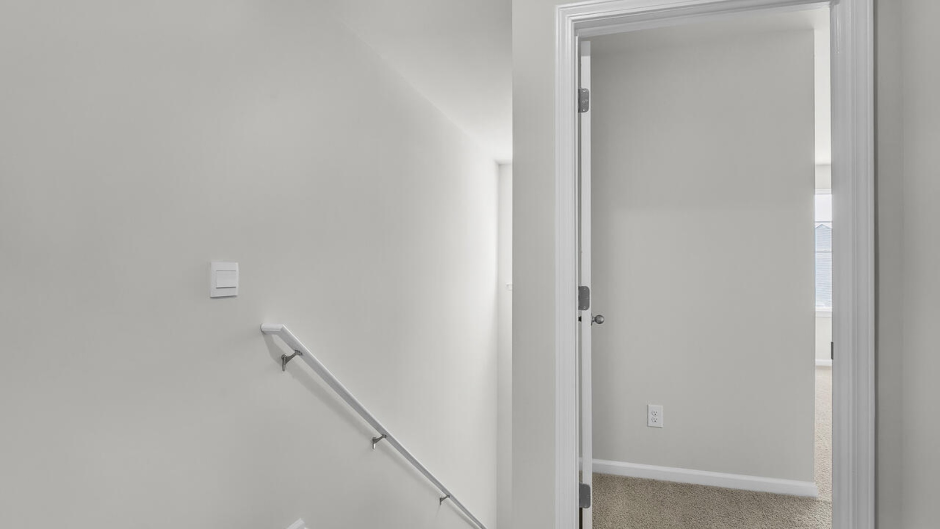 The second floor features the primary bedroom with a walk-in closet and double vanities. It also includes two additional bedrooms, a shared bathroom, and a laundry room for convenience. The bathrooms are equally elegant, featuring matching granite and a primary suite with a glass shower that feels like your own personal spa.