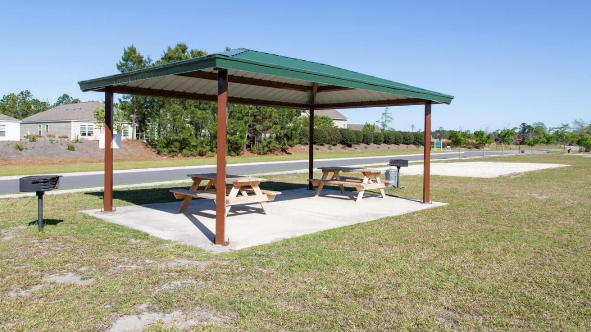 Homeowners enjoy the community amenities a pool, pavilion, fire pit, playground, grill stations and sand volleyball.