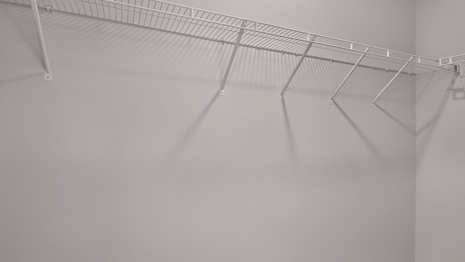 The second floor features the primary bedroom with a walk-in closet and double vanities. It also includes two additional bedrooms, a shared bathroom, and a laundry room for convenience.