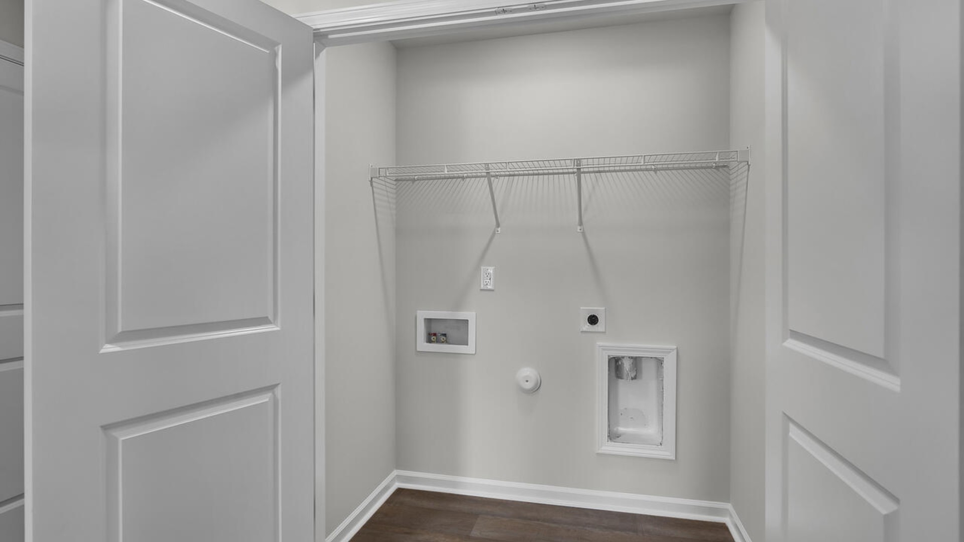 It also includes two additional bedrooms, a shared bathroom, and a laundry room for convenience. The bathrooms are equally elegant, featuring matching granite and a primary suite with a glass shower that feels like your own personal spa.