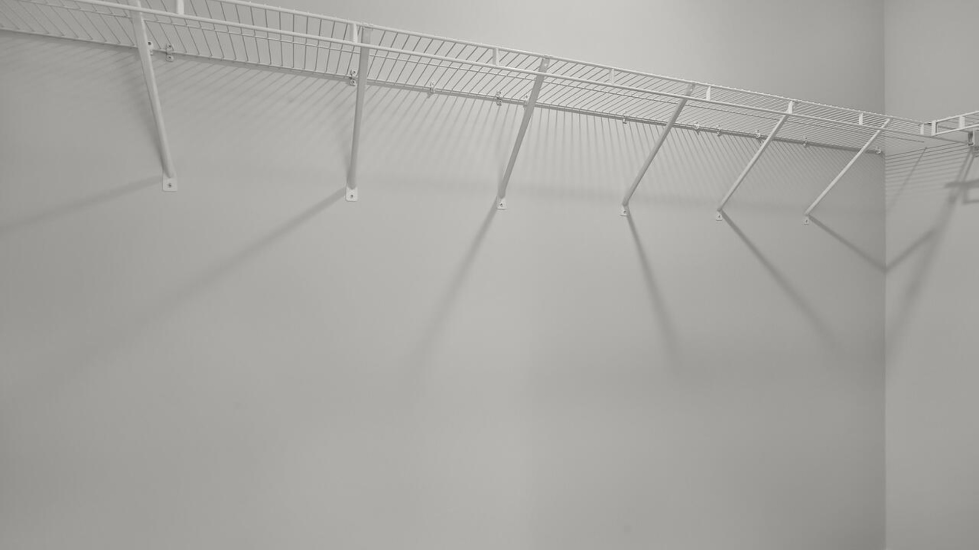 The second floor features the primary bedroom with a walk-in closet and double vanities. It also includes two additional bedrooms, a shared bathroom, and a laundry room for convenience. T