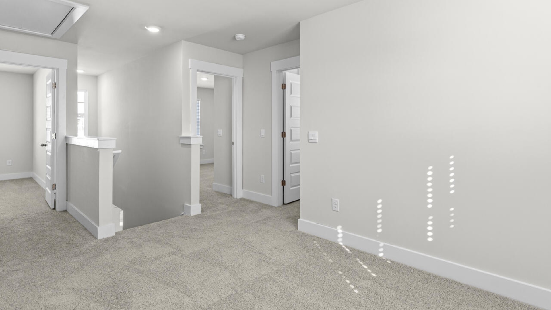 Upstairs, there are 3 more bedrooms, a shared bathroom and a loft area, adding to the flexibility of the layout. For those in search of a contemporary townhome with a functional layout, the Norman is an excellent choice.