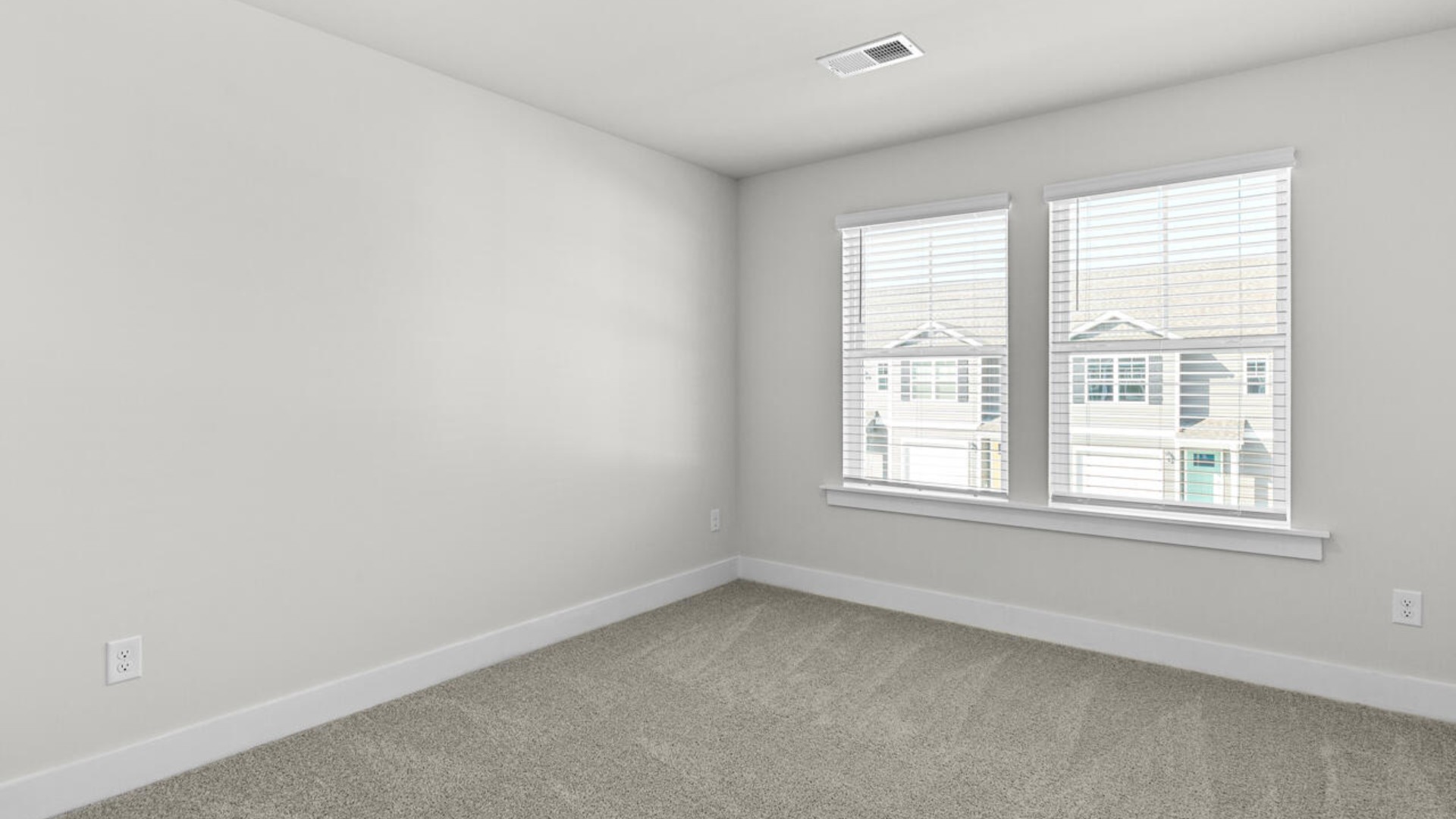Upstairs, there are 3 more bedrooms, a shared bathroom and a loft area, adding to the flexibility of the layout. For those in search of a contemporary townhome with a functional layout, the Norman is an excellent choice.
