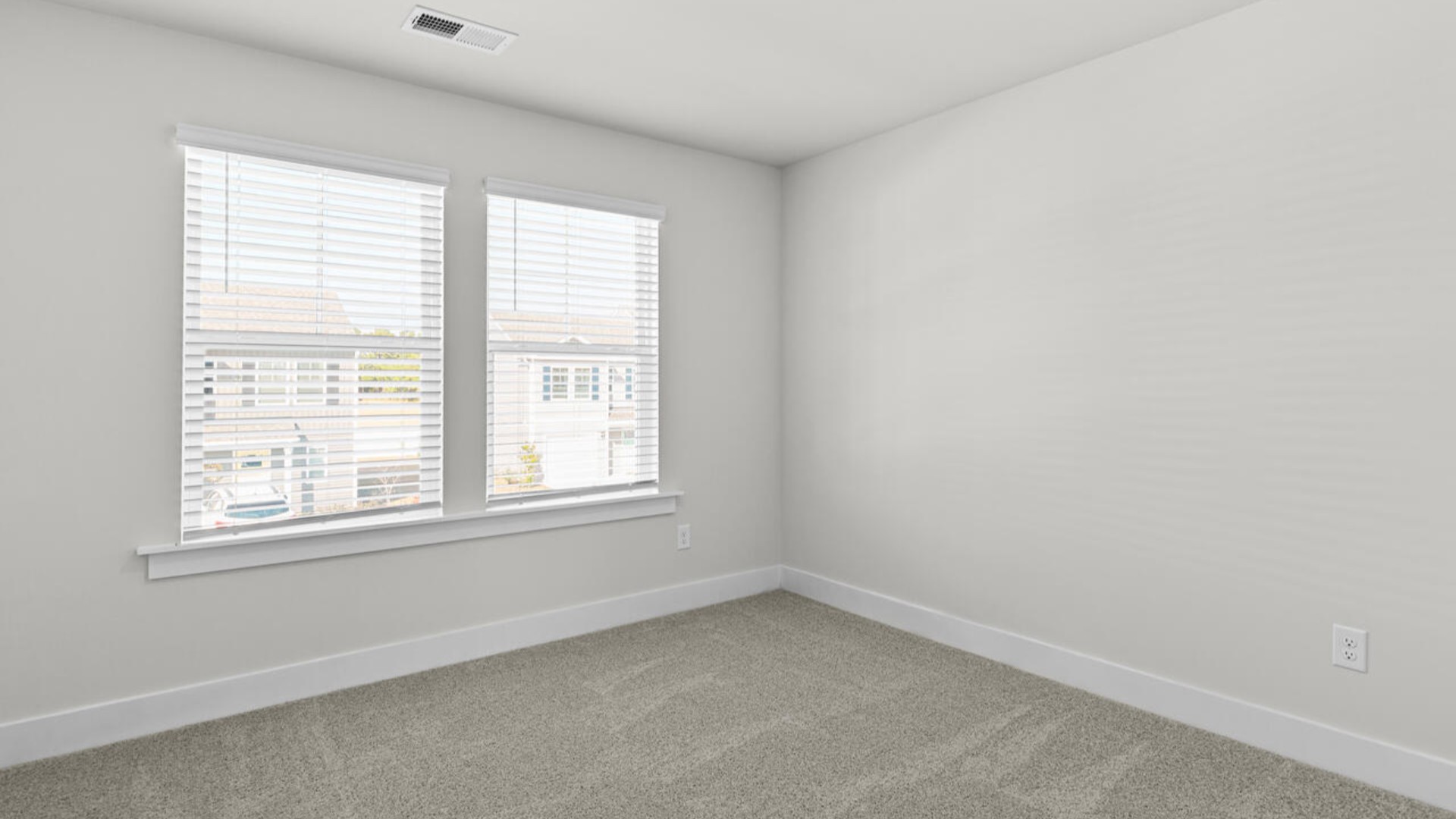 Upstairs, there are 3 more bedrooms, a shared bathroom and a loft area, adding to the flexibility of the layout. For those in search of a contemporary townhome with a functional layout, the Norman is an excellent choice.